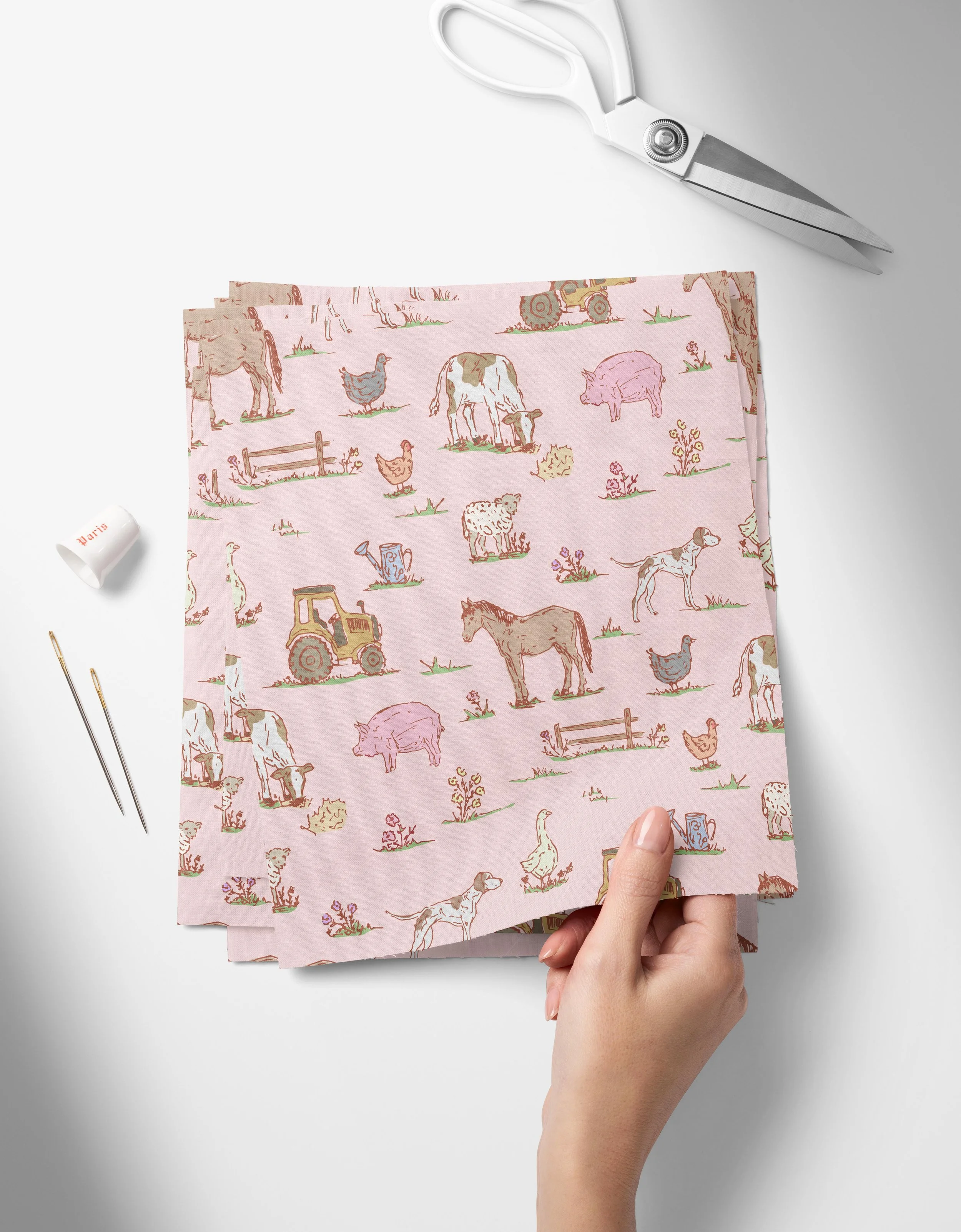 Farm-pink-01-01_Top View of Fabric Swatches Held in Hand Mockup by Creatsy®.jpg