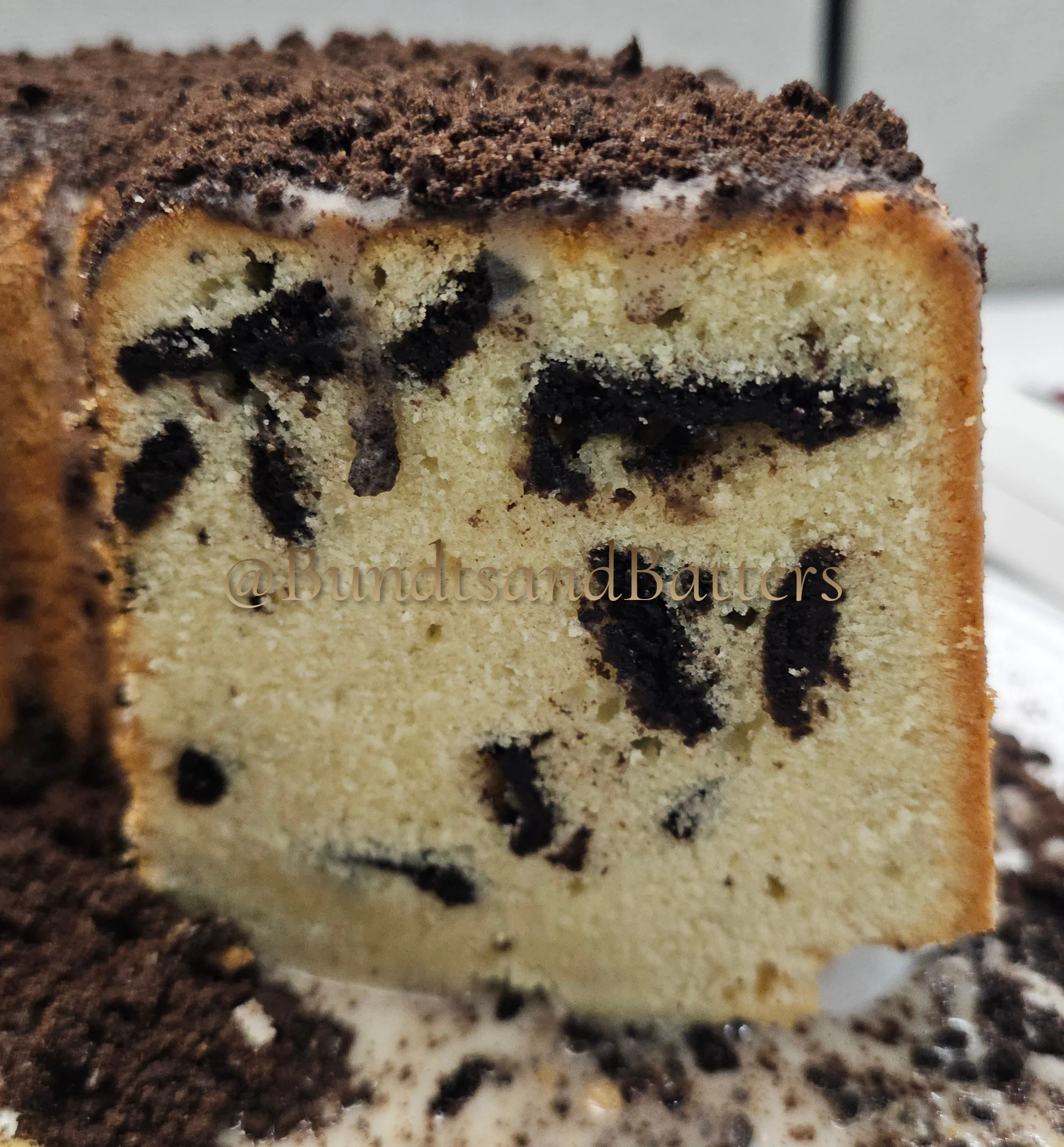 Cookies and Cream Pound Cake with Vanilla Glaze and Crushed Oreo Topping