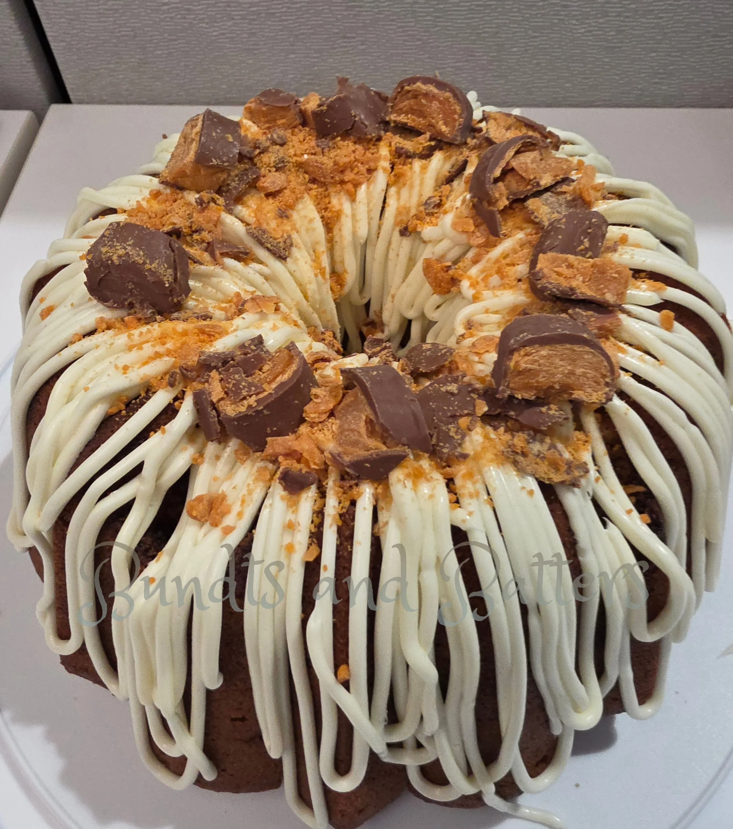 Butterfinger Pound Cake with Cream Cheese Frosting and Crushed Butterfinger Candy