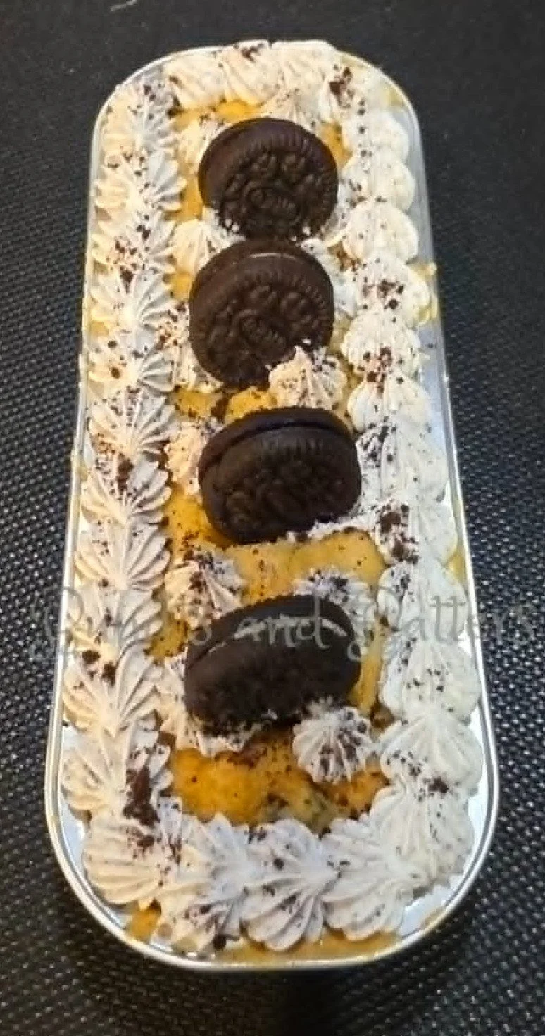 Cookies and Cream "Ounce" Cakes with Oreo Frosting and Mini Oreo Cookies