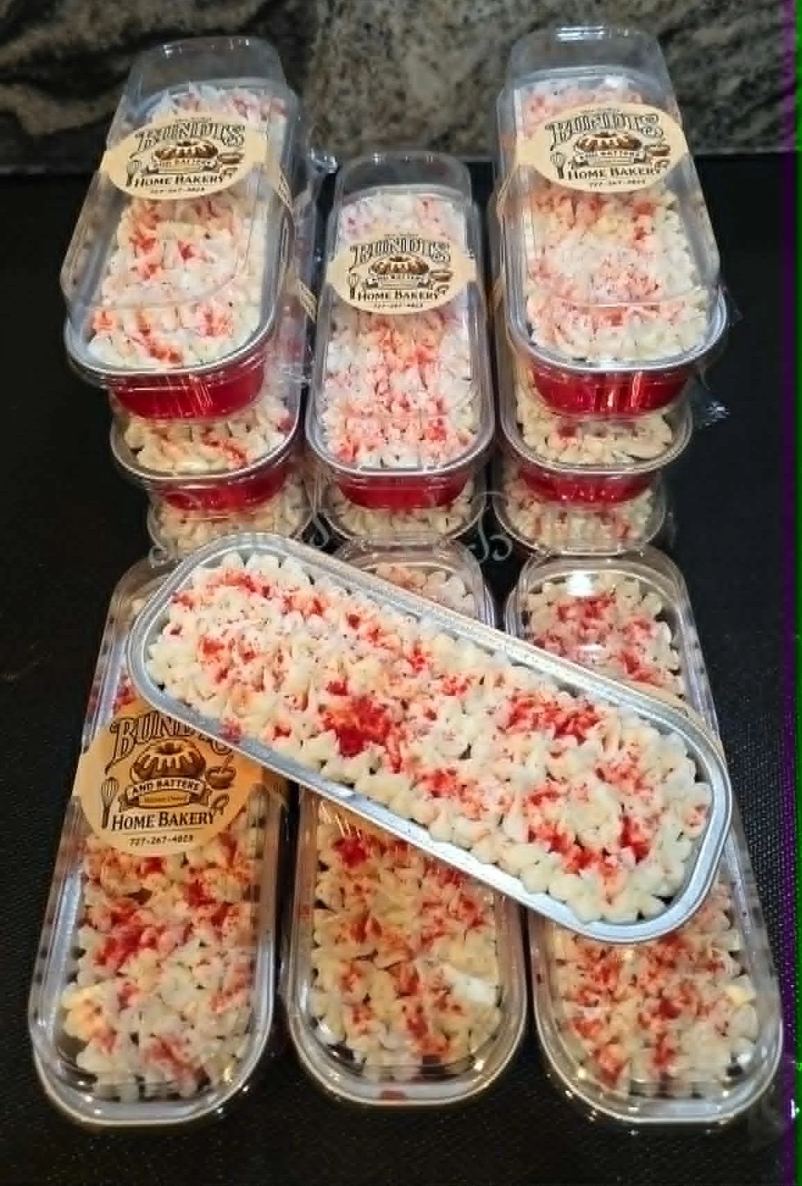 Strawberry "Ounce" Cakes with Vanilla Frosting and Crushed Strawberry Topping