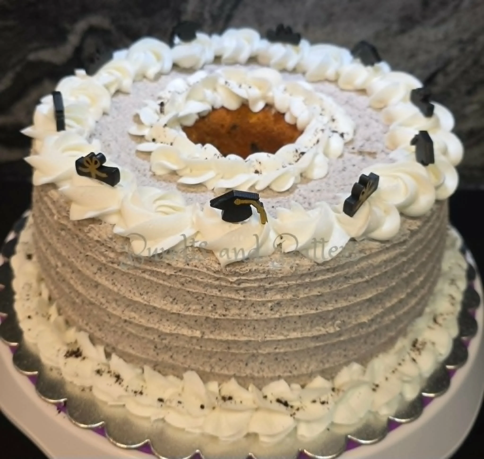 Cookies and Cream Pound Cake with Vanilla Frosting and Crushed Oreo Garnish
