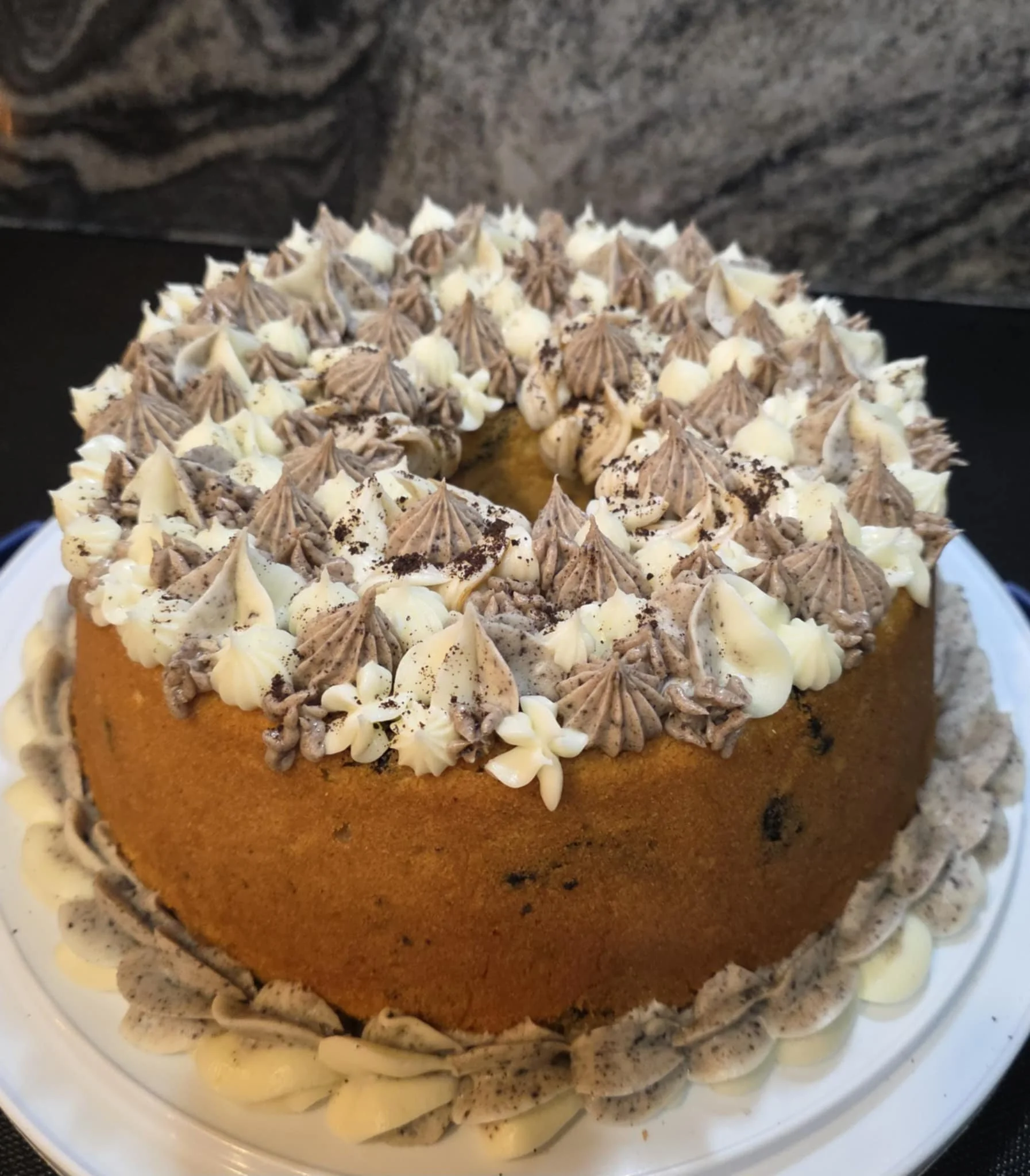 Oreo Cookies and Cream Pound Cake with Oreo Cream Cheese Frosting and Crushed Oreo Topping