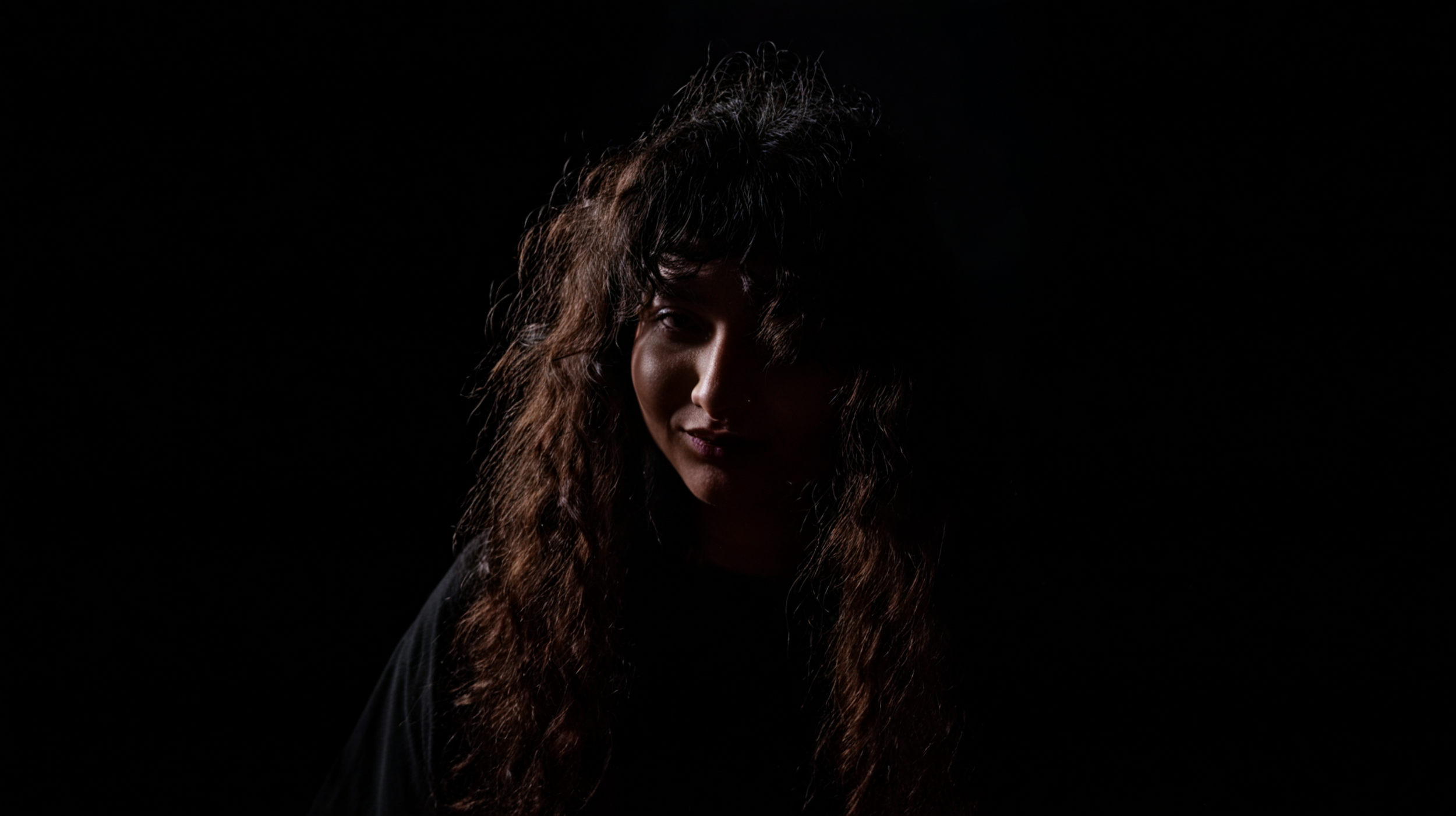 pr1ncesaurus_A_photo_a_person_with_long_curly_hair_backlit_by_093ca4cd-b178-4aa2-a467-8d6cf1780c1b_3 (1).png