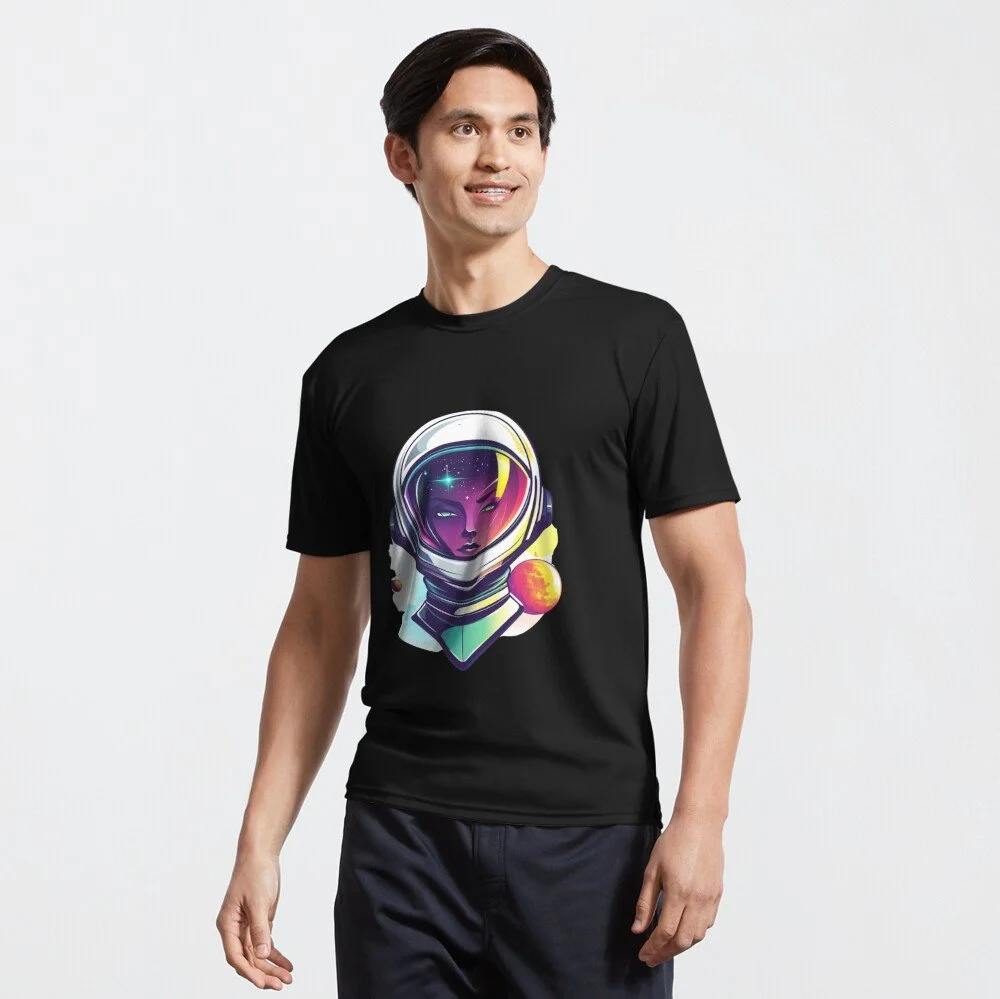A man wearing a black t-shirt with a colorful astronaut design on the front.