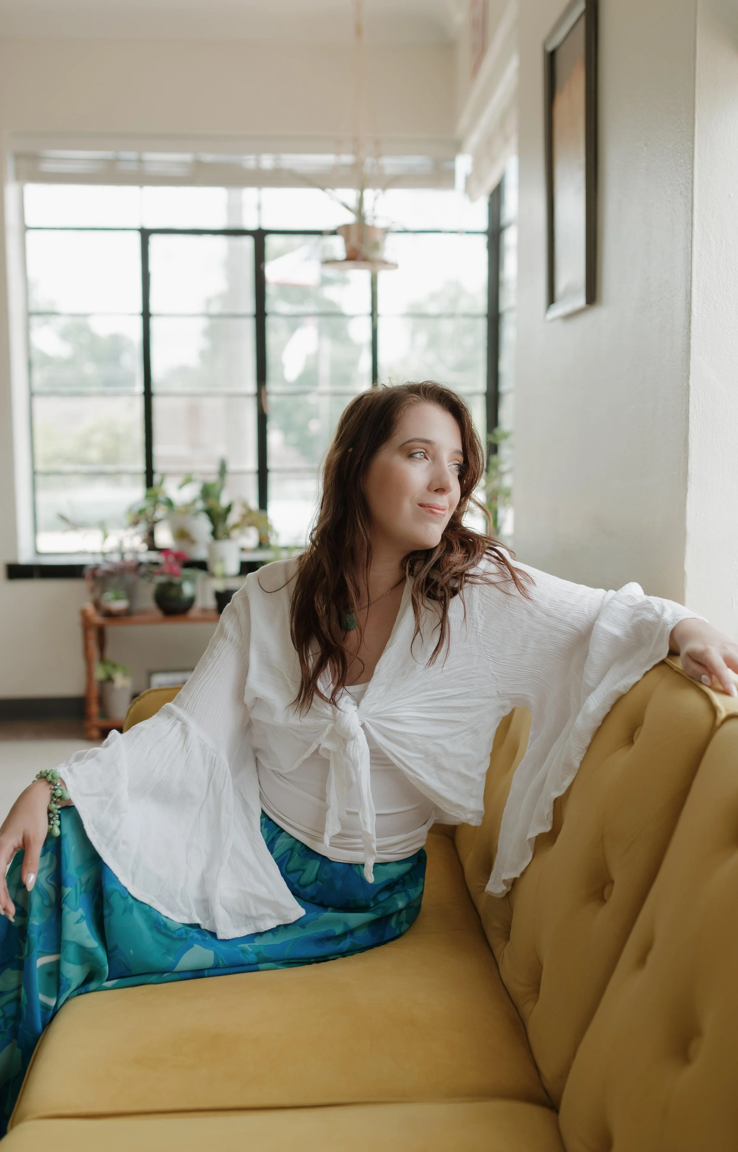 Saint Louis Therapist Caitlin Mansdoerfer in warm office setting