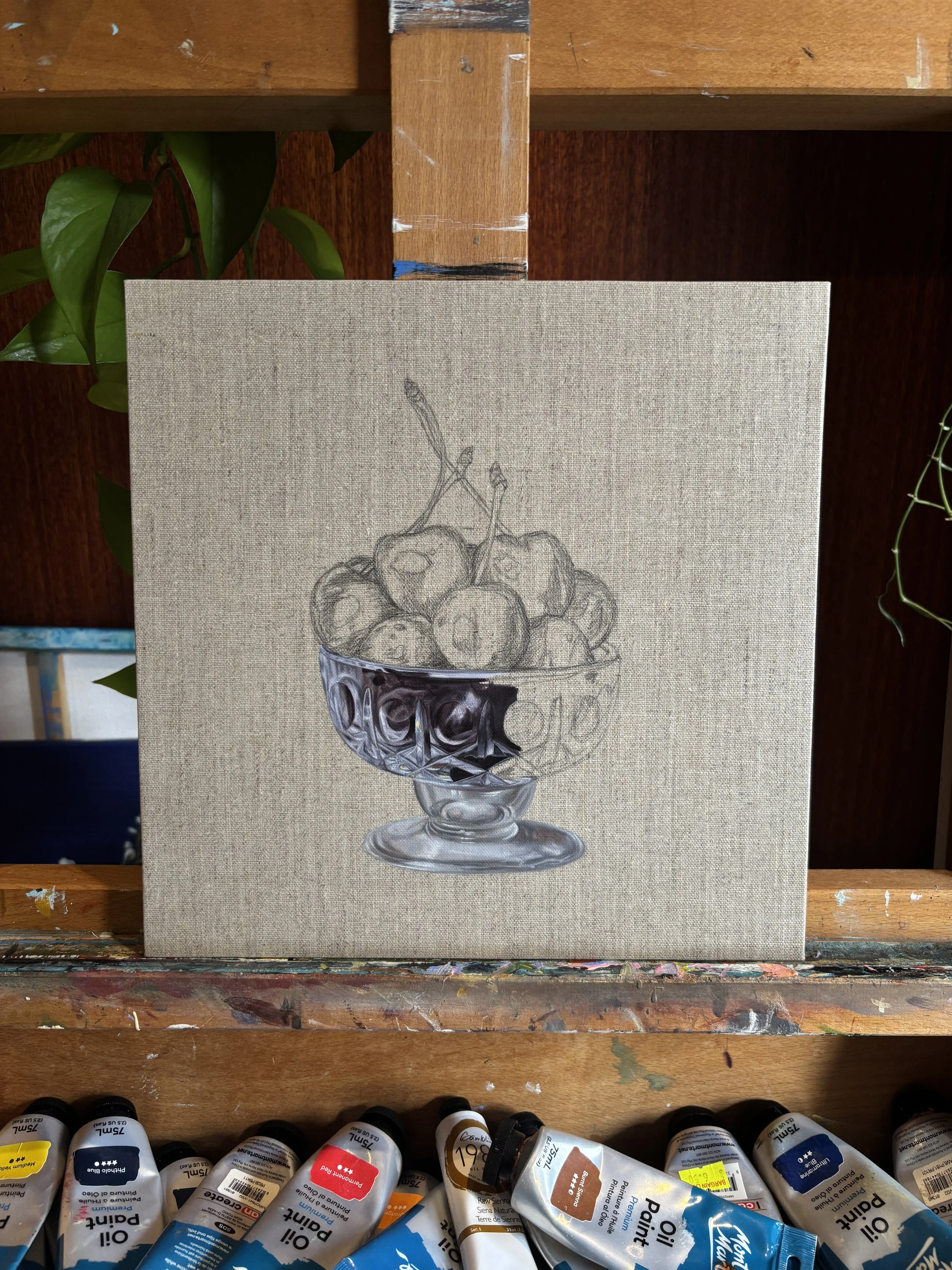 A painting of a glass bowl filled with blueberries, with some blueberries and a cherry stem on top, on a beige canvas background.