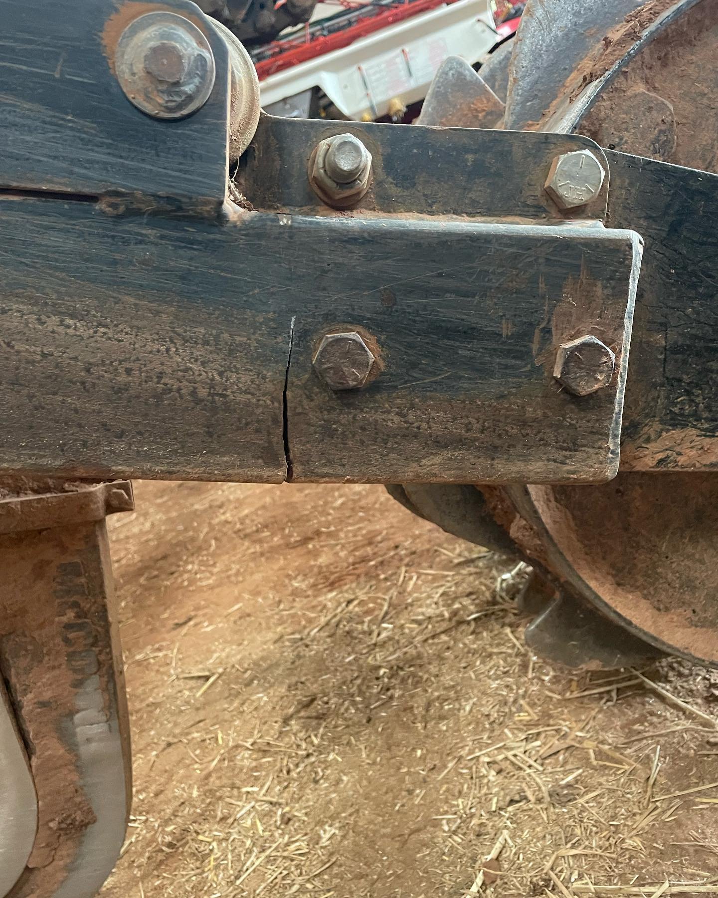 Subsoiler packer roller repairs on site the other day