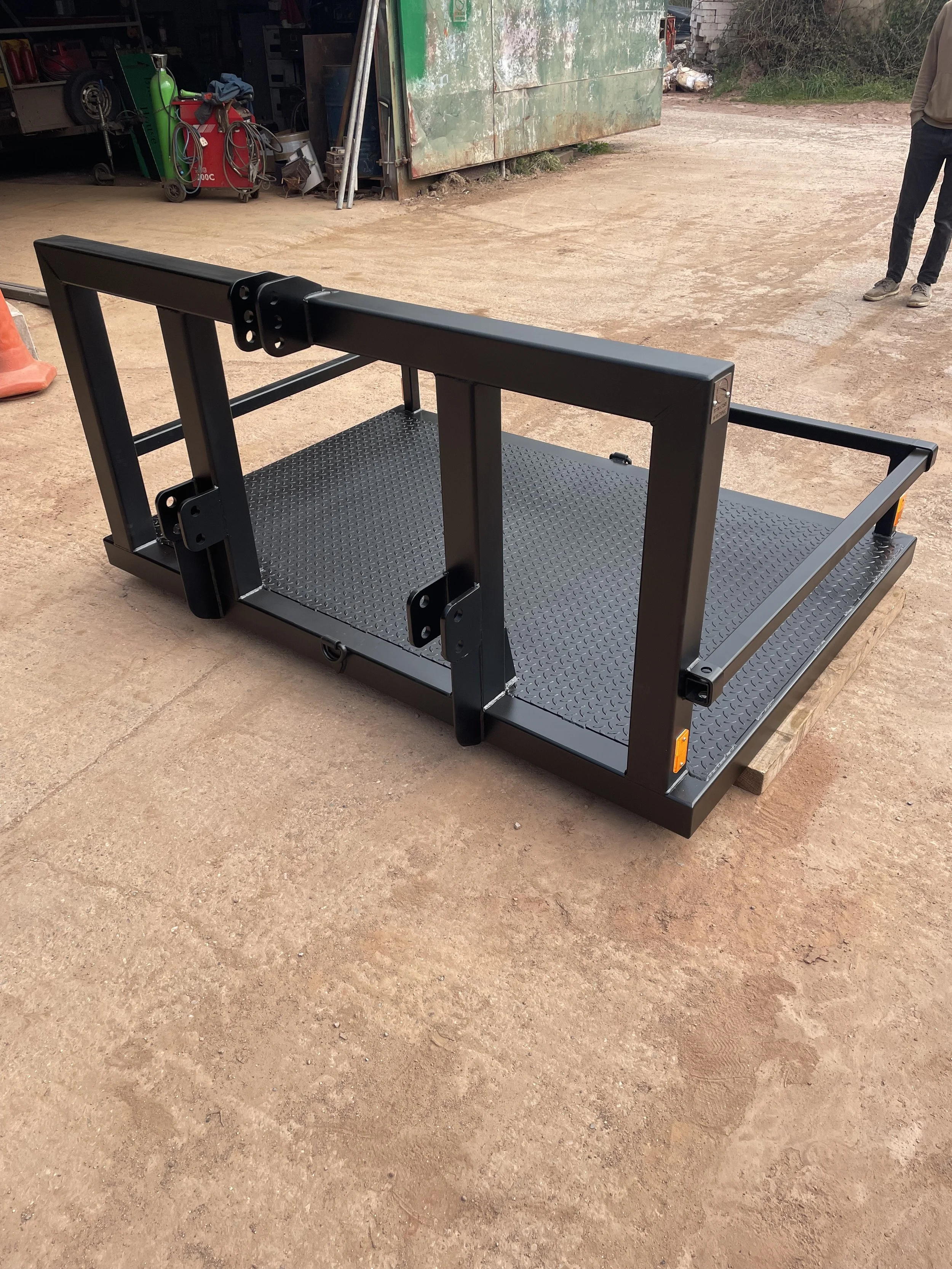 Quadbike holder fabricated for the front of a tractor