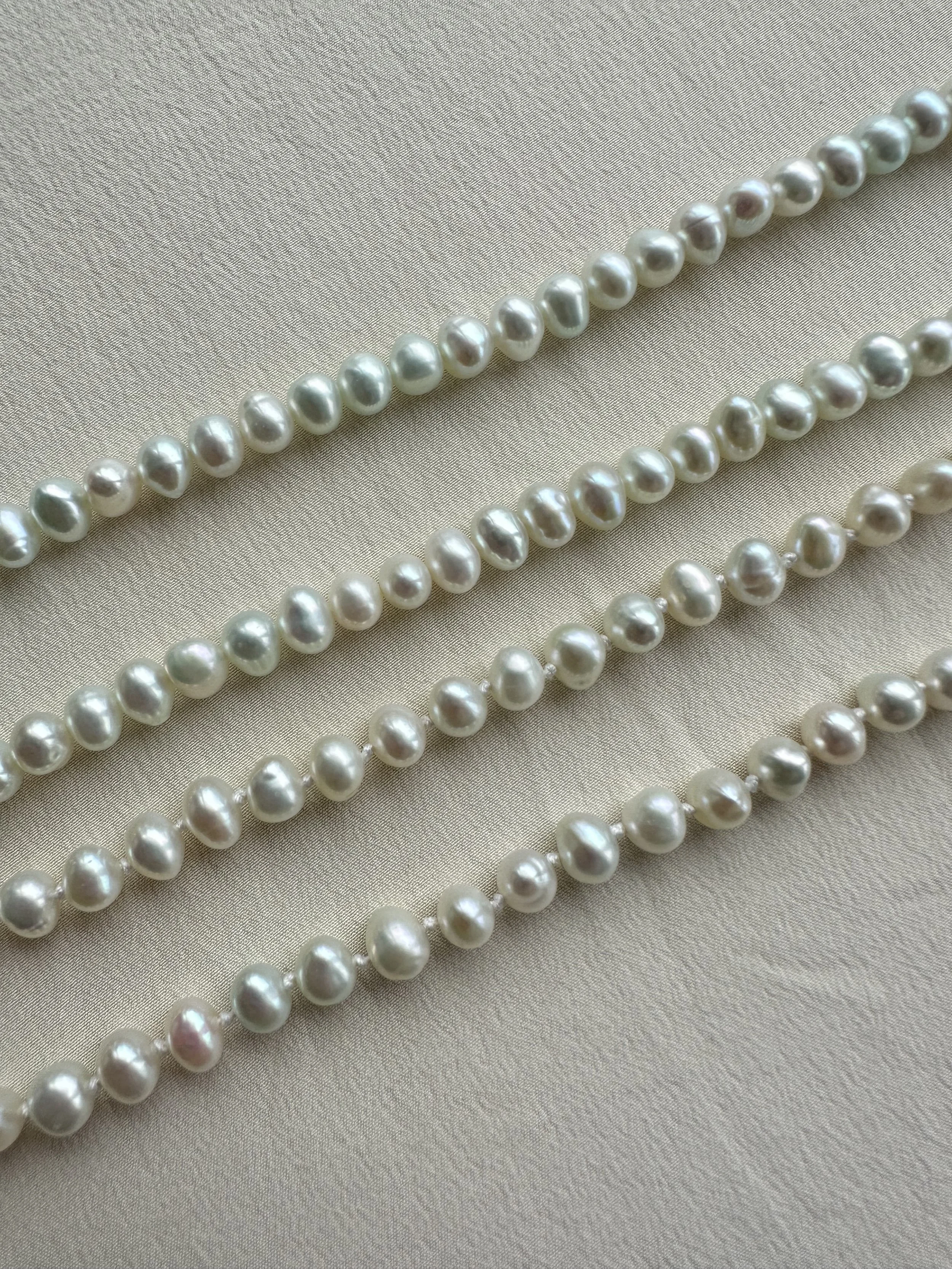 Vintage pale blue pearl necklaces