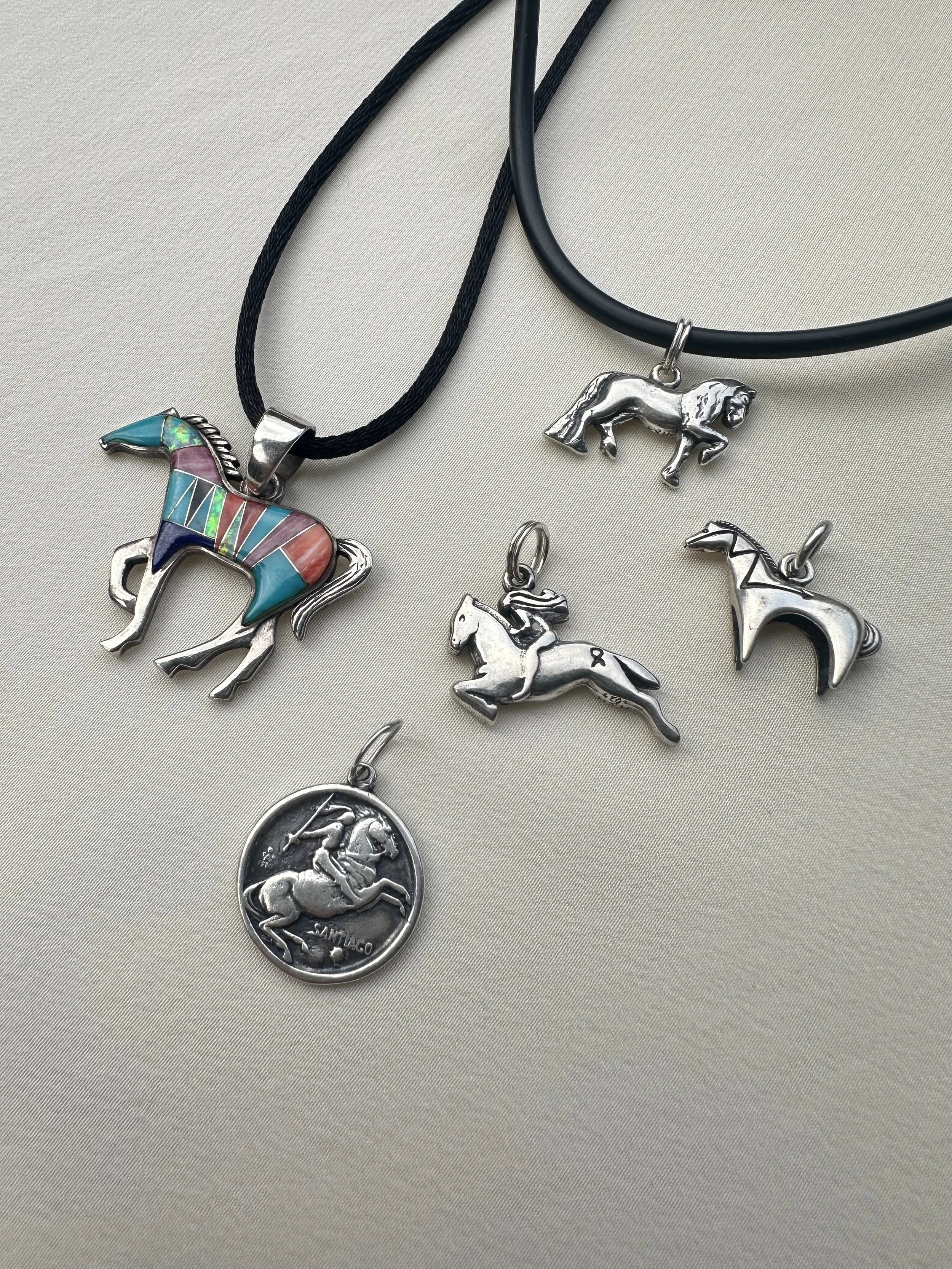 Selection of vintage 925 horse pendants