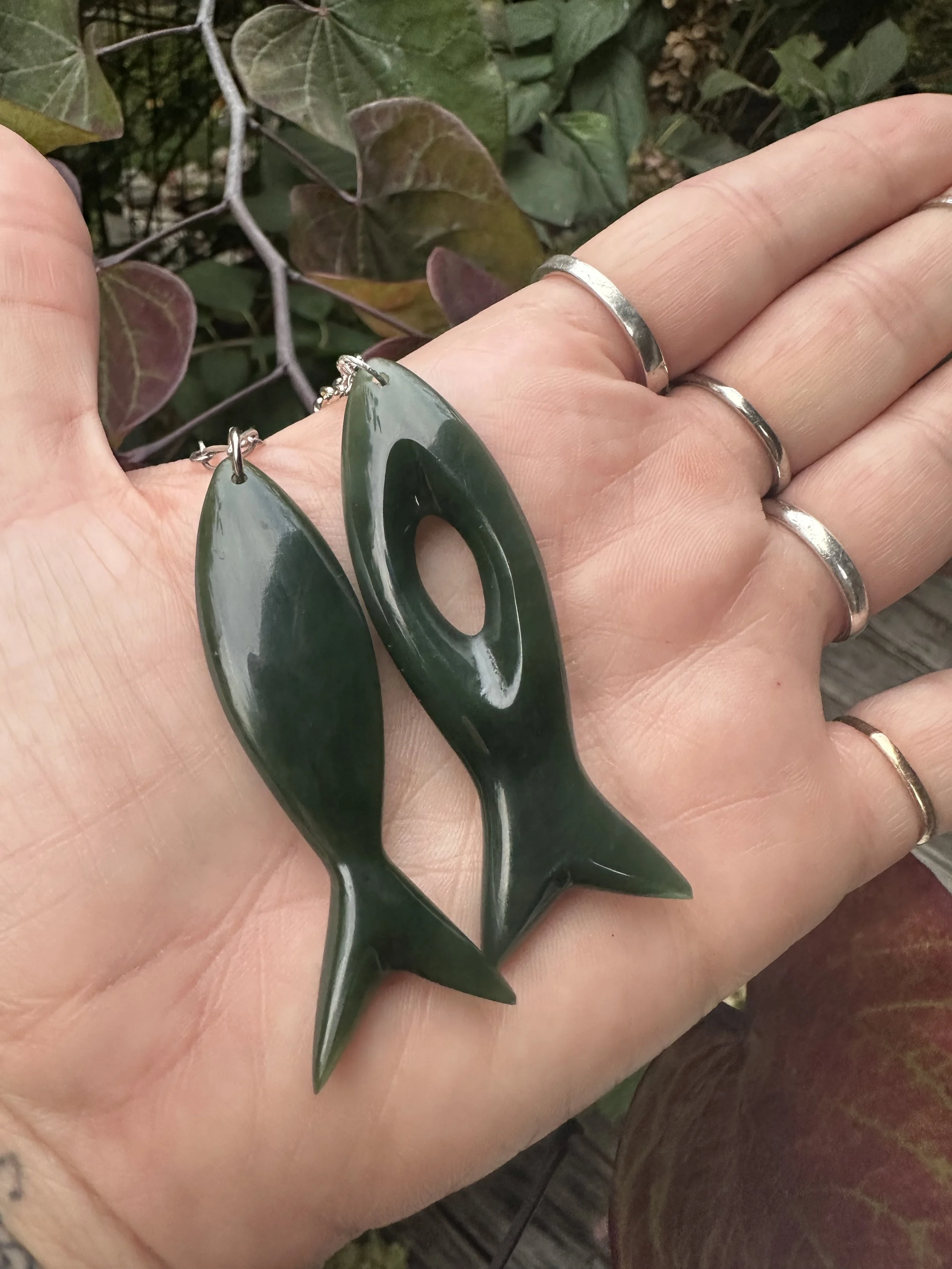 Greenstone fish pendants