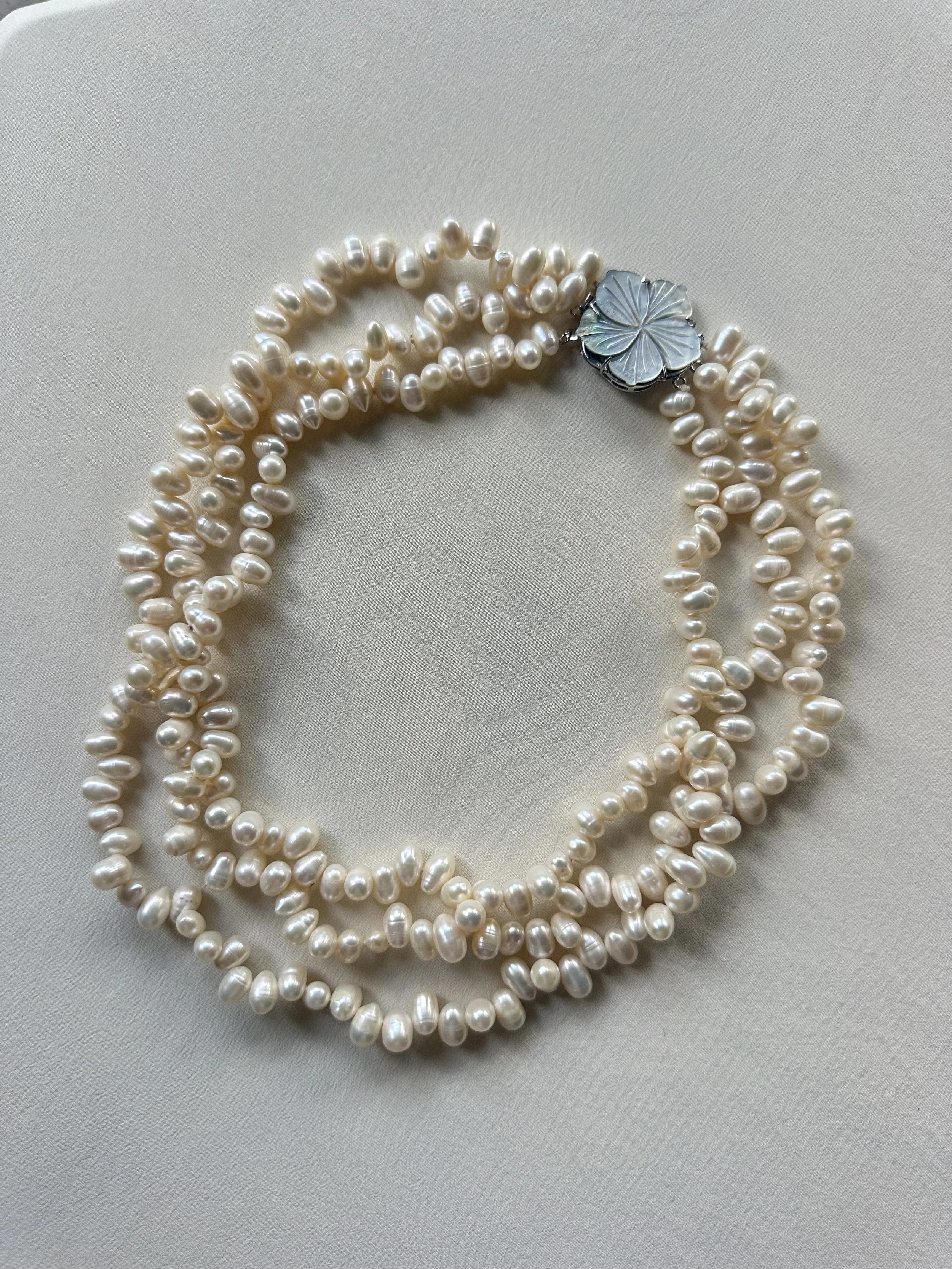 Vintage petal pearl triple strand