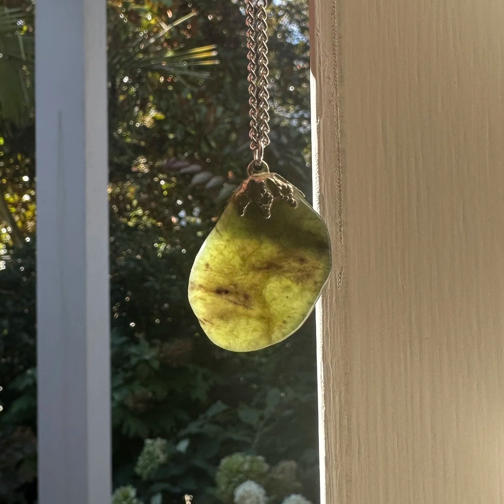 Greenstone pendant on chain