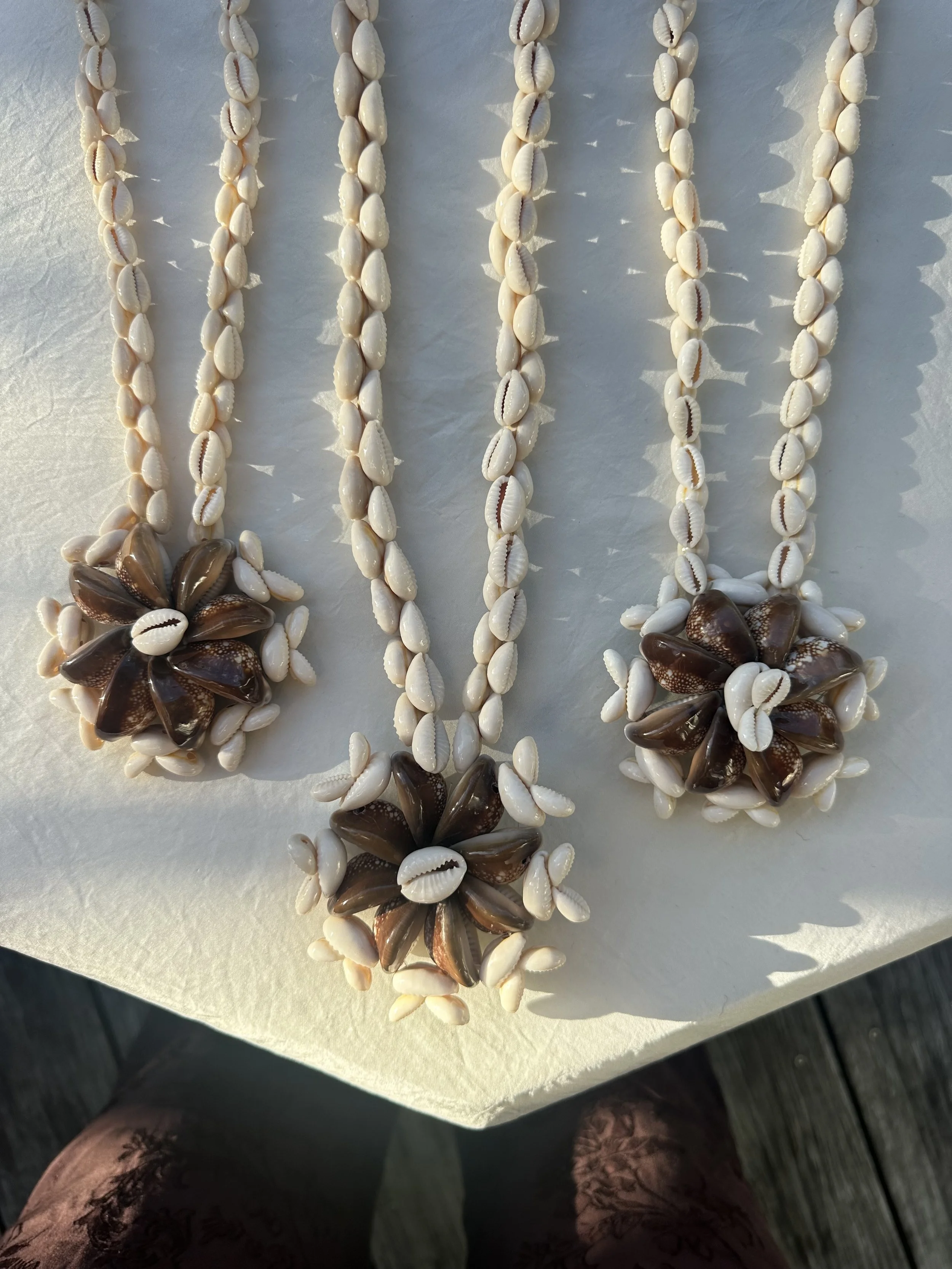 Vintage cowrie shell necklaces
