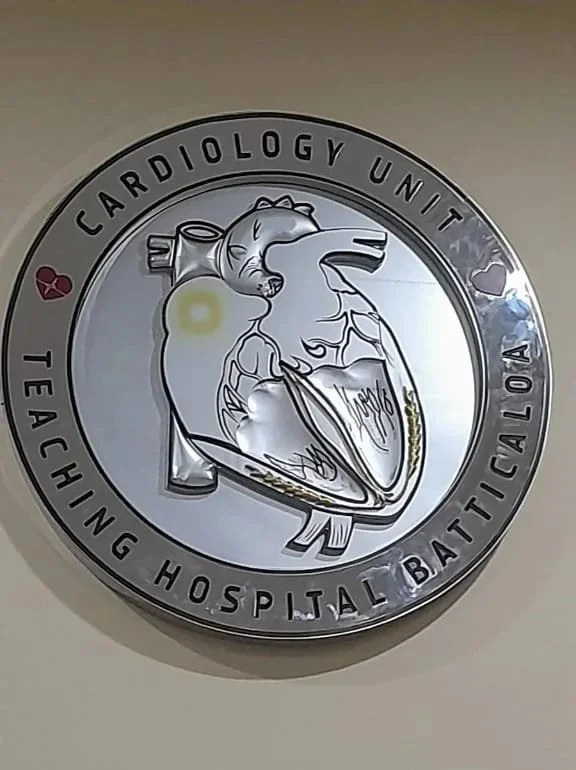 A circular emblem for the Cardiology Unit at Teaching Hospital Baticaloa, featuring a stylized heart and anatomy diagram of a human heart.