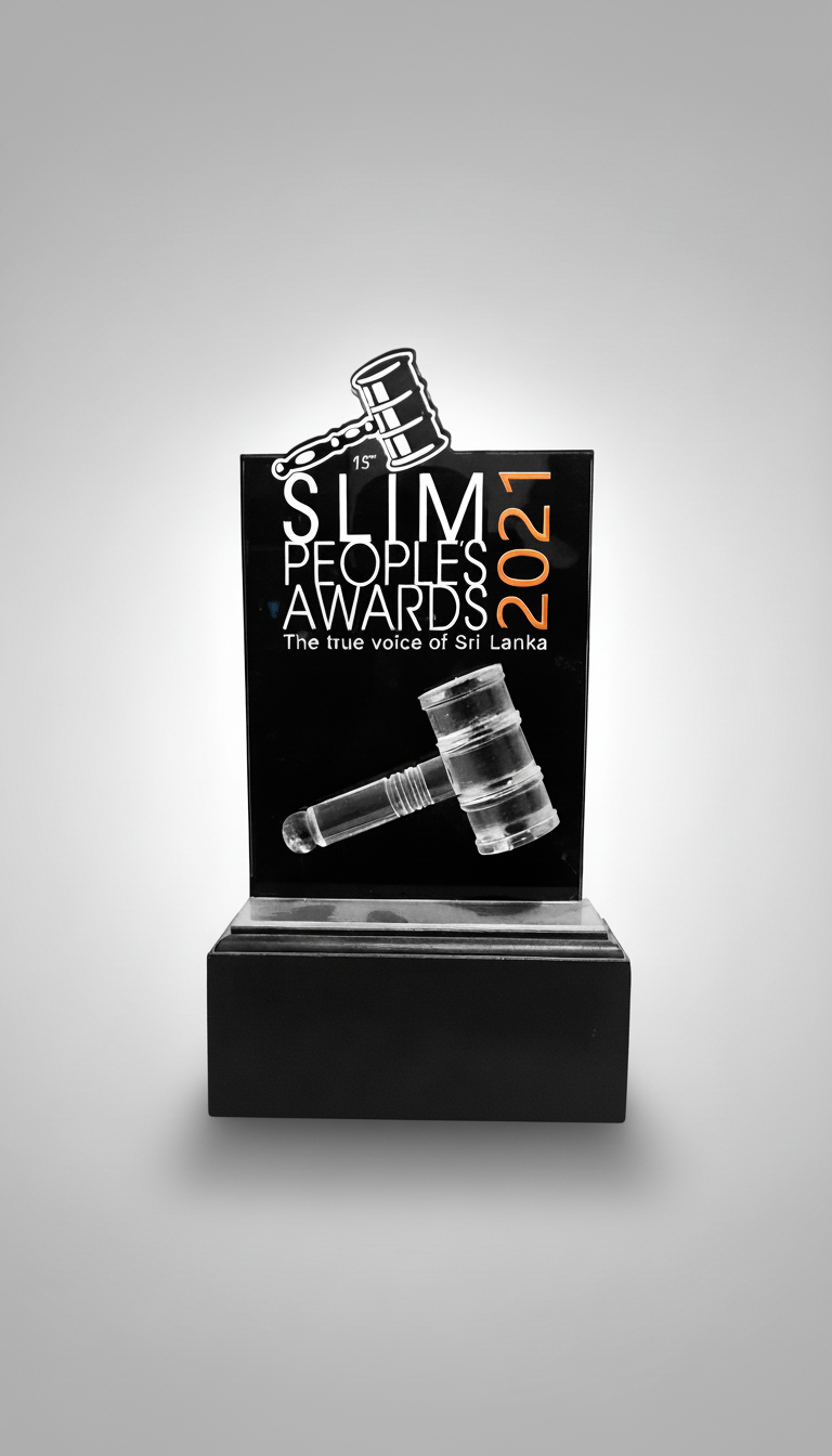 Award trophy in black and white with a gavel and hammer illustrations, text reading '15th Slim People’s Awards 2021, The true voice of Sri Lanka'.
