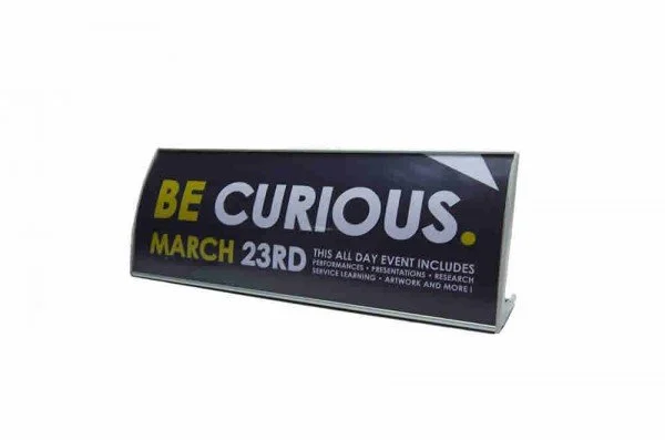 Event sign promoting March 23rd with the message 'Be Curious' and details about the event activities.