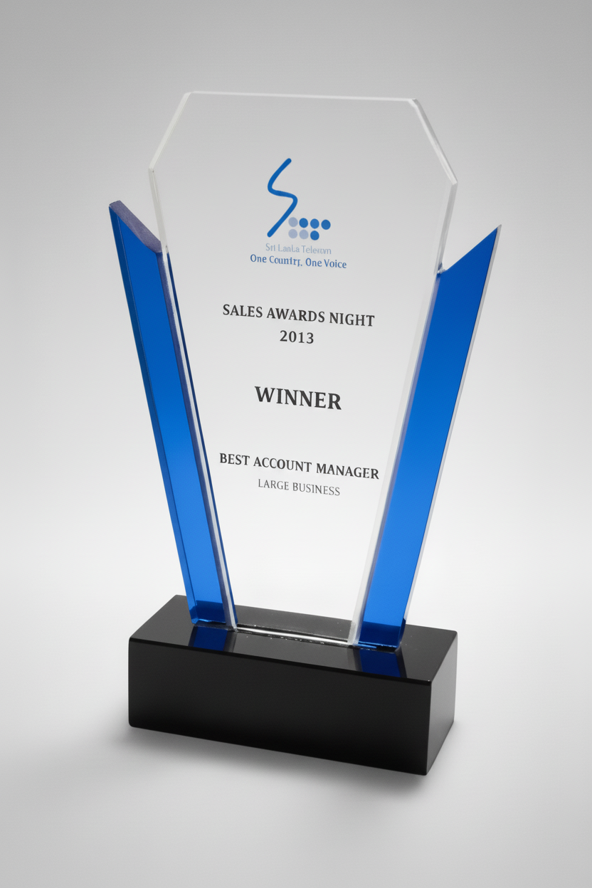 Crystal award with blue accents and black base recognizing Best Account Manager at 2013 Sales Awards Night