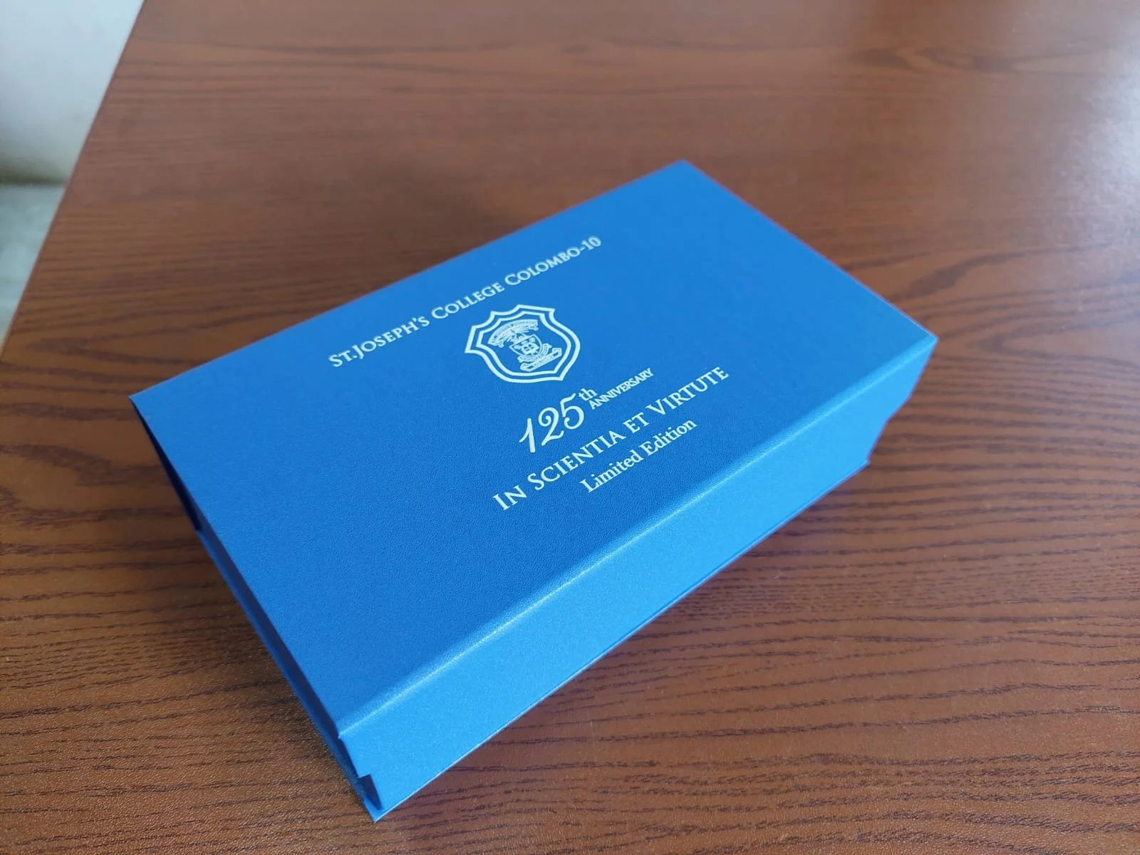 Blue box celebrating St. Joseph's College Colombo 10's 125th anniversary, with the Latin phrase 'In Scientia et Virtute' and labeled as a limited edition.