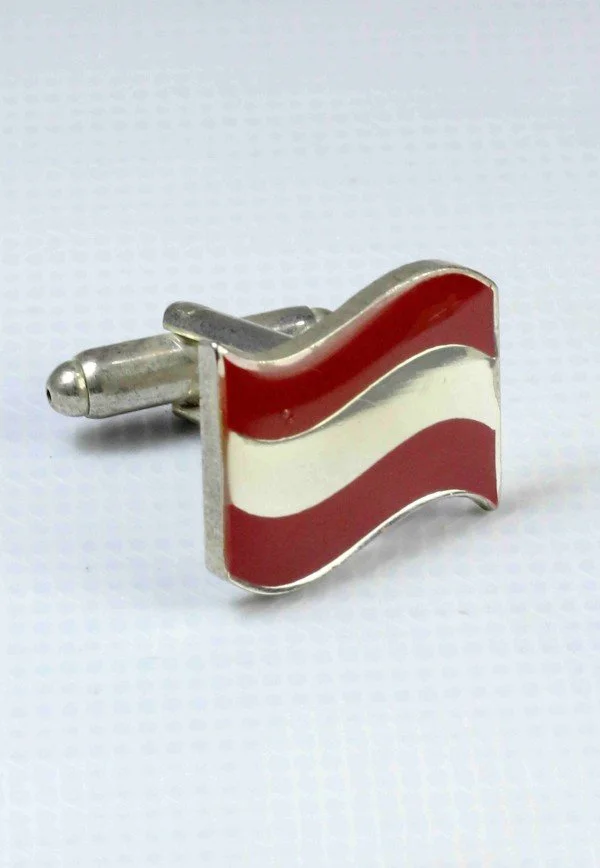Metal lapel pin with red, white, and dark red wave design