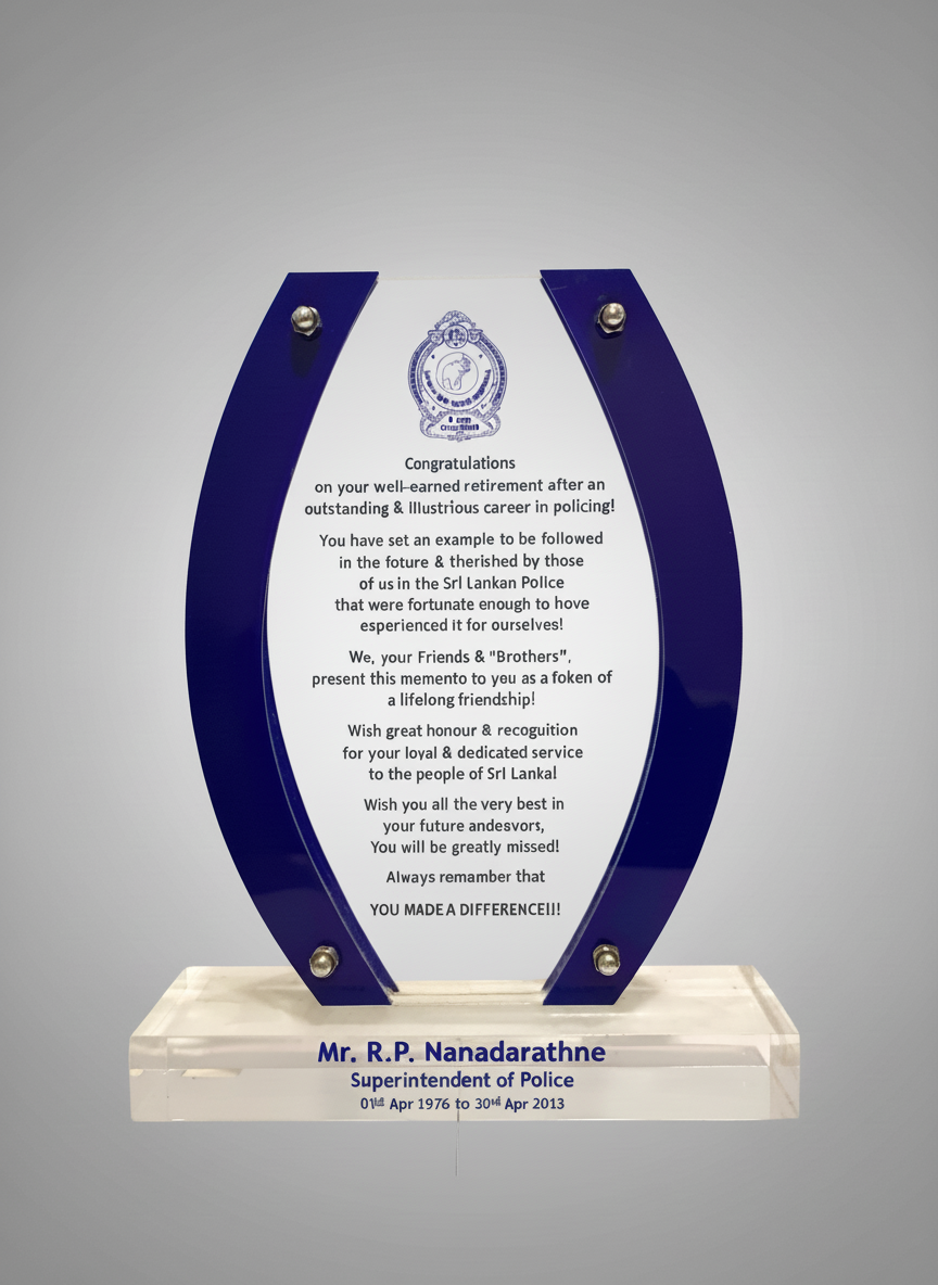 A police retirement plaque for Mr. R.P. Nanadarathne, Superintendent of Police, from April 1, 1976, to April 30, 2013.