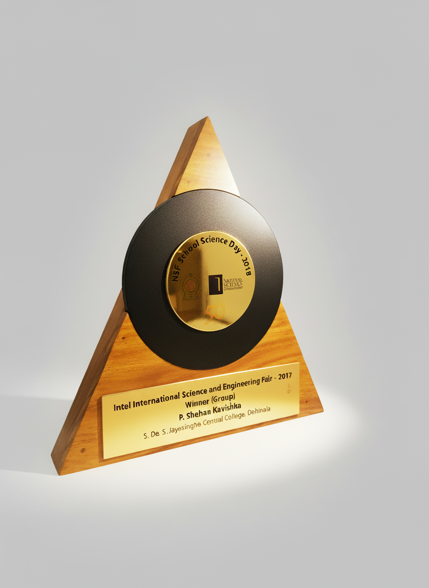 A black and gold trophy with a circular central emblem, mounted on a wooden triangular base. The emblem displays the text "NSF School Science Day 2018" and numbered "1". The plaque on the base reads "Intel International Science and Engineering Fair 2