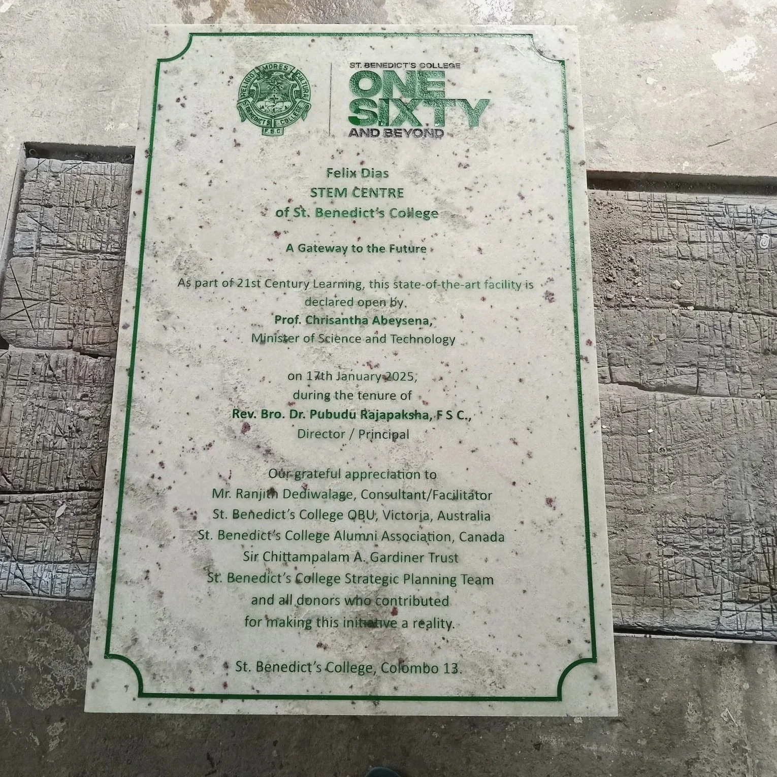 A commemorative plaque at St. Benedict's College in Colombo, Sri Lanka, marking the opening of a STEM center by Felix Dias, dated January 17, 2025, with signatures and expressions of gratitude to contributors.