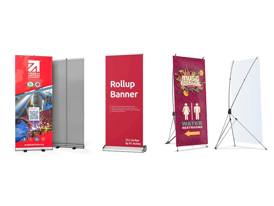 Four different roll-up banners, one advertising Made in Britain, one labeled Rollup Banner, one for a music festival with men and women restroom directions, and an empty white banner.