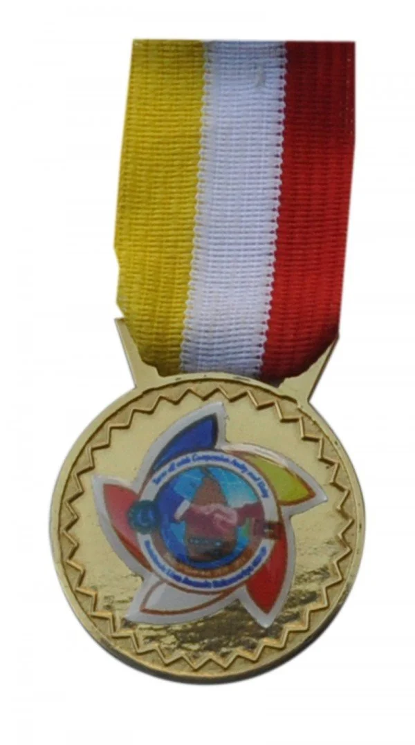 Gold medal with a star-shaped design in the center and a ribbon with yellow, white, and red stripes.
