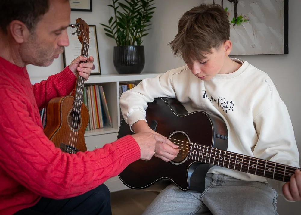 Learning the ropes — or strings! One note at a time.