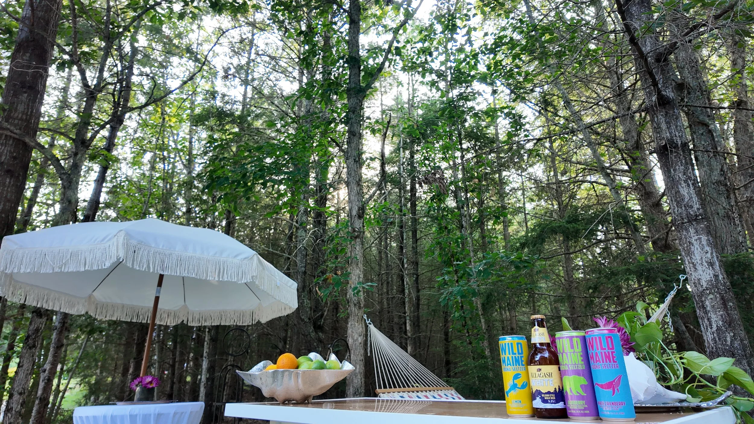 white fringe umbrella rentals maine