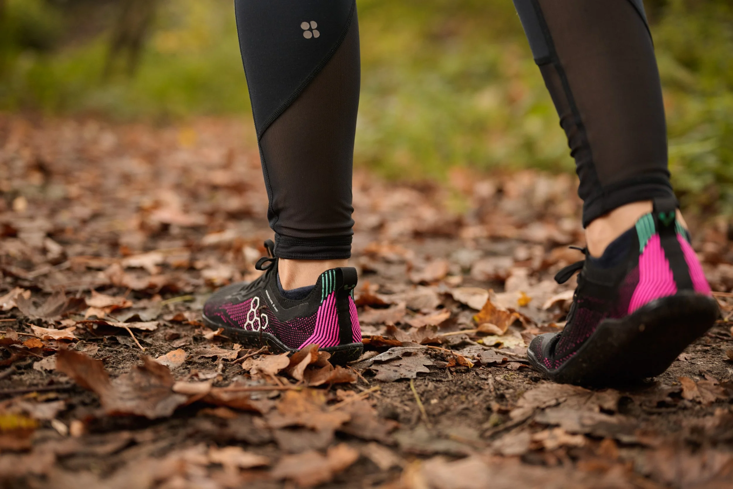 Candice walking in nature on autumn leaves