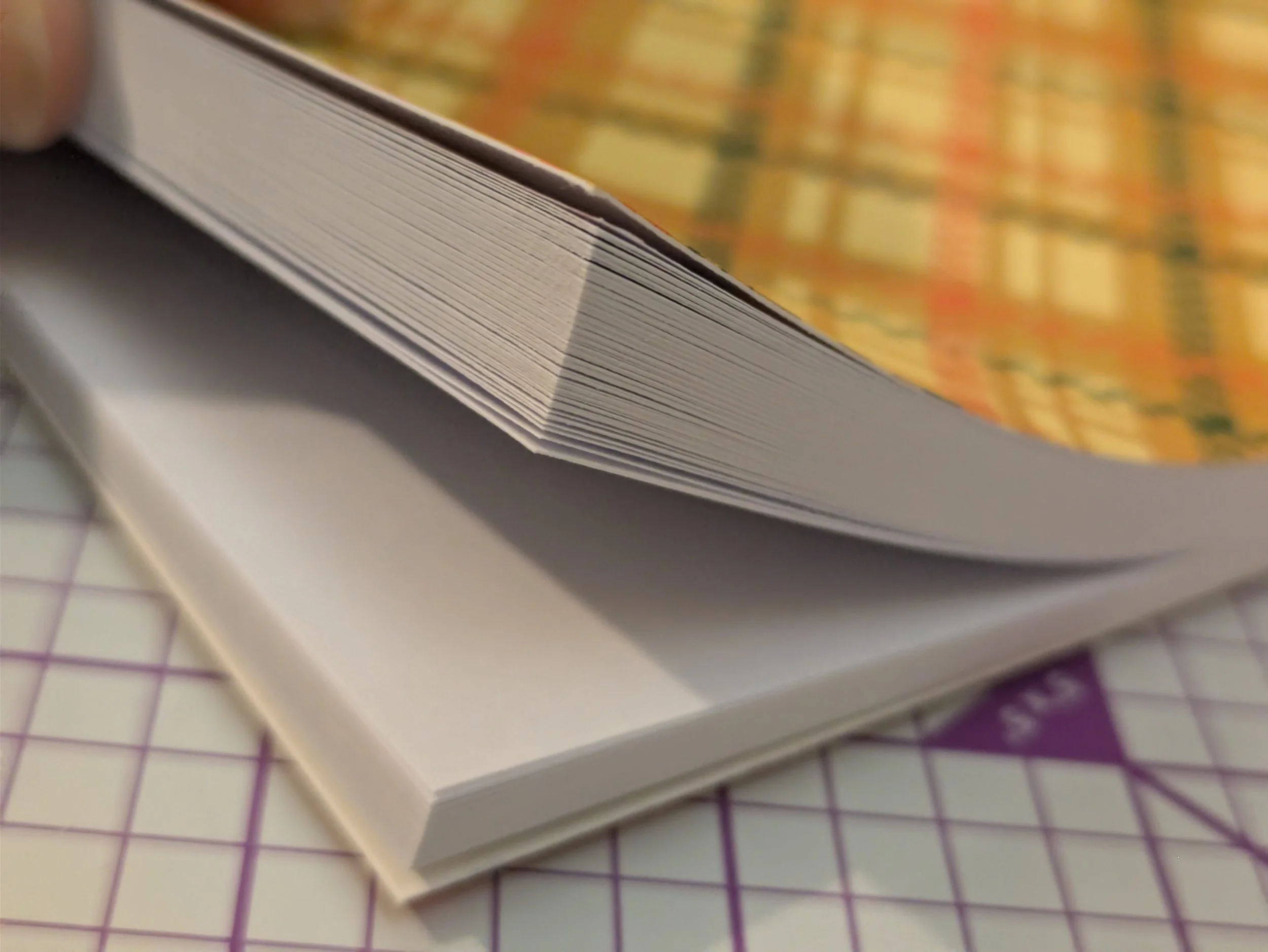 Notepad A6 yellow plaid show pages.jpg