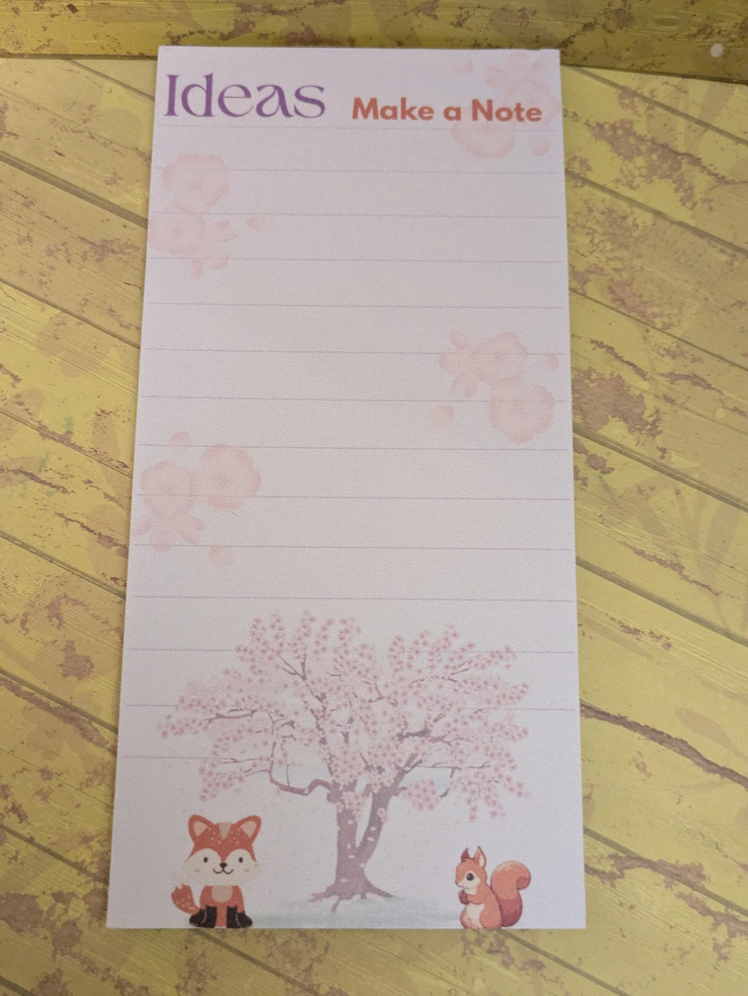 Notepad tall cherry blossom with animals tree.jpg