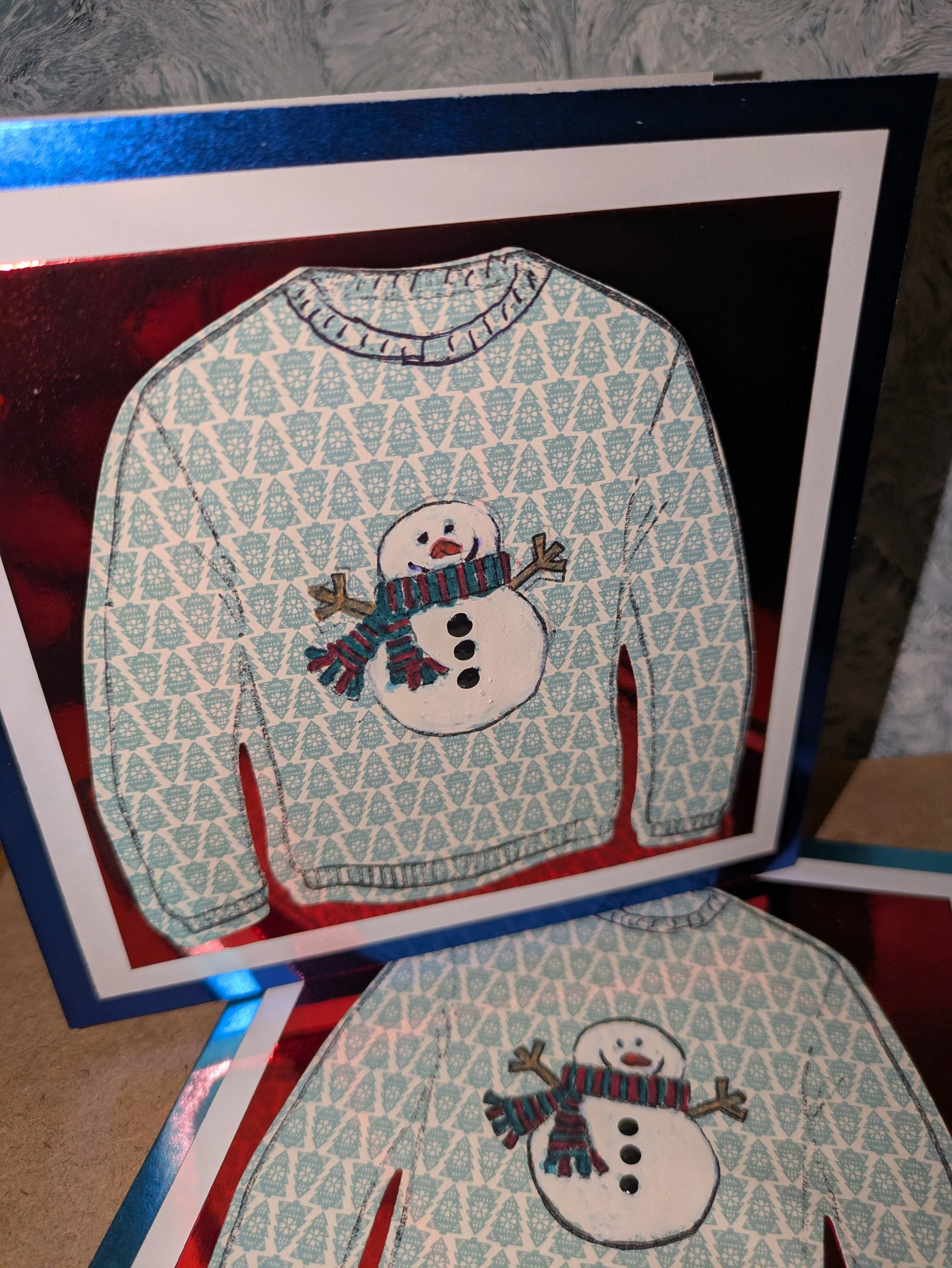 Snowman green xmas tree jumper mirror card background.jpg