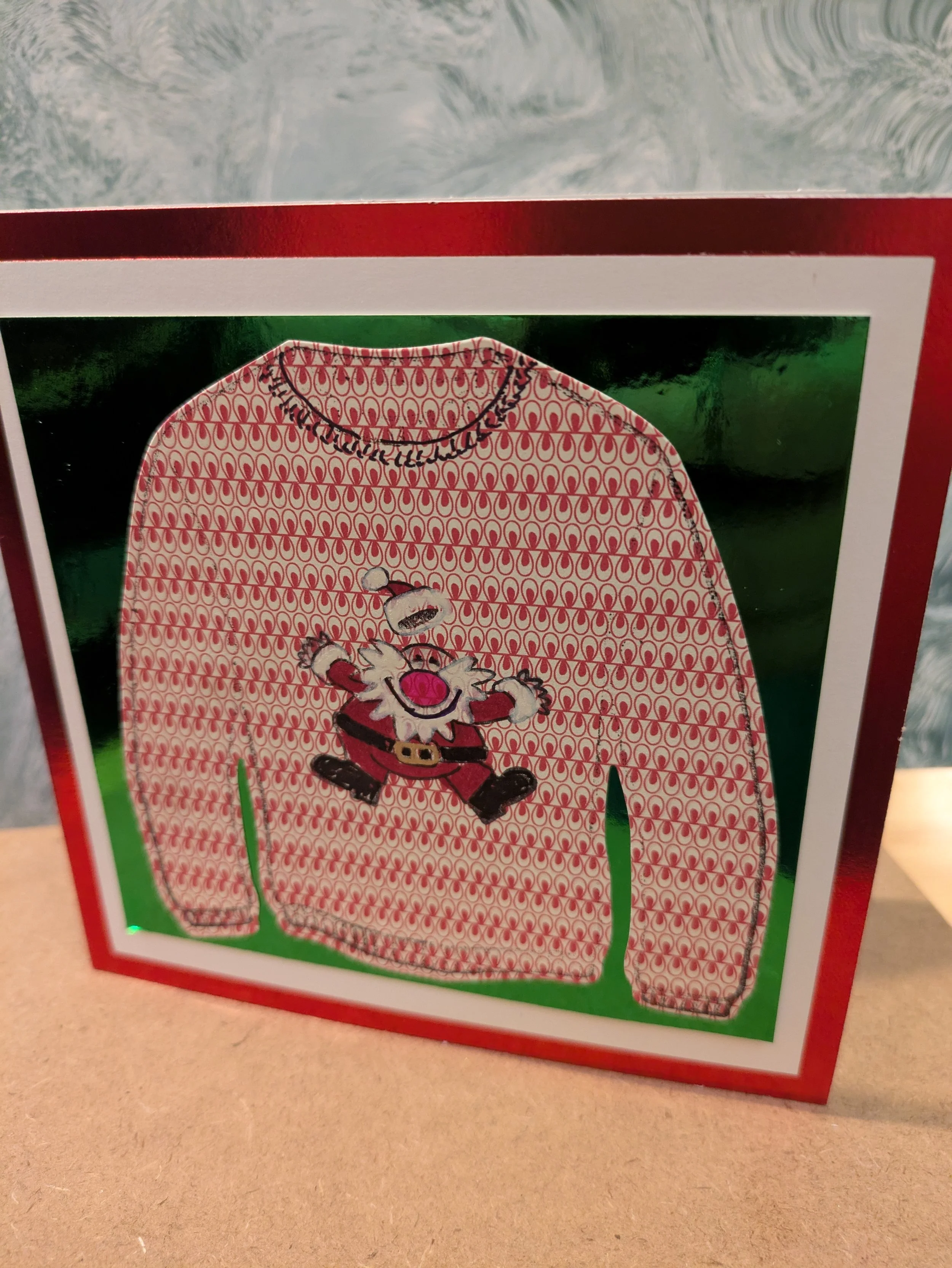 Santa traditional red xmas jumper. green background.jpg