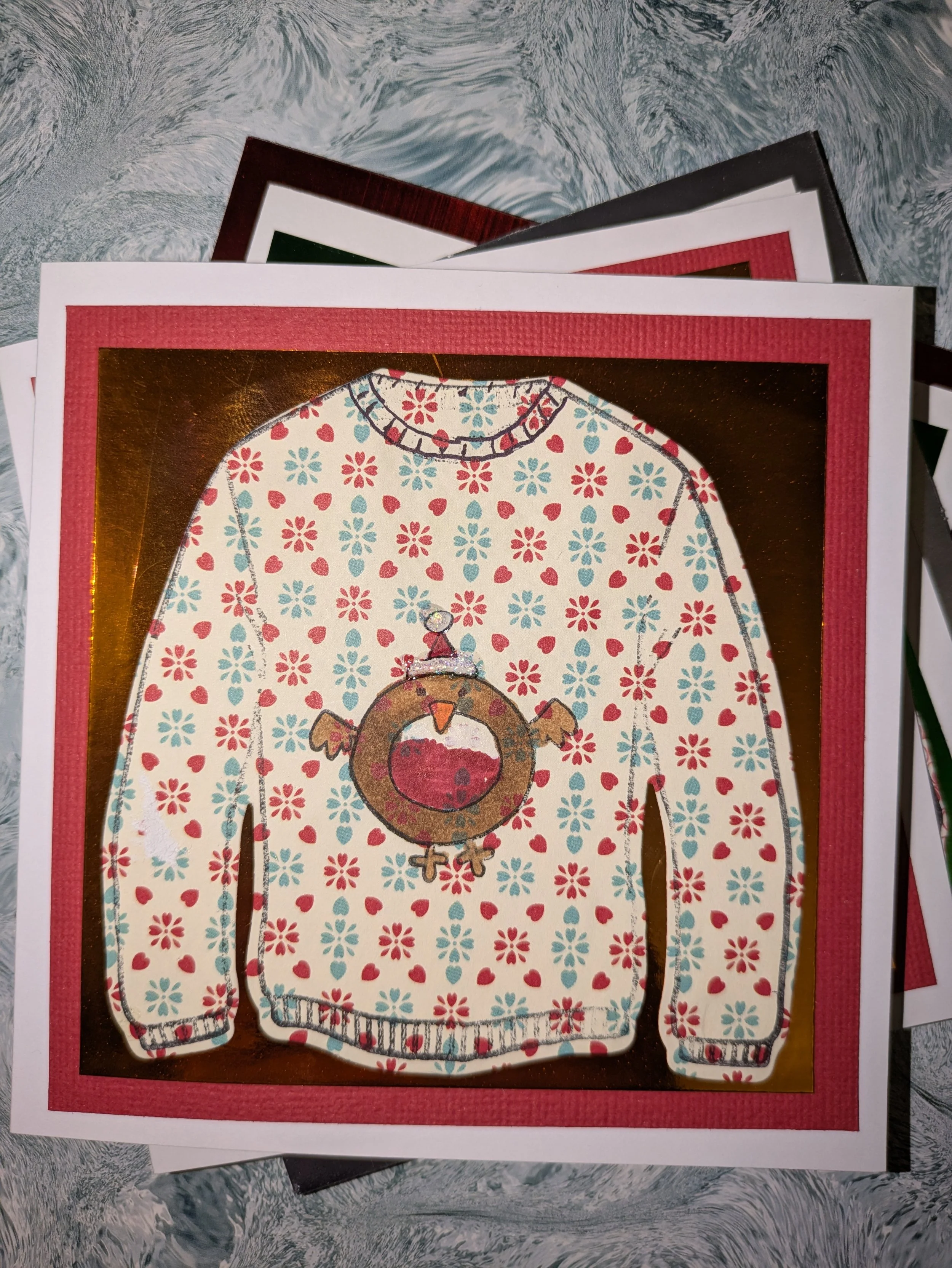 Robin traditional xmas jumper red gold backgropund.jpg