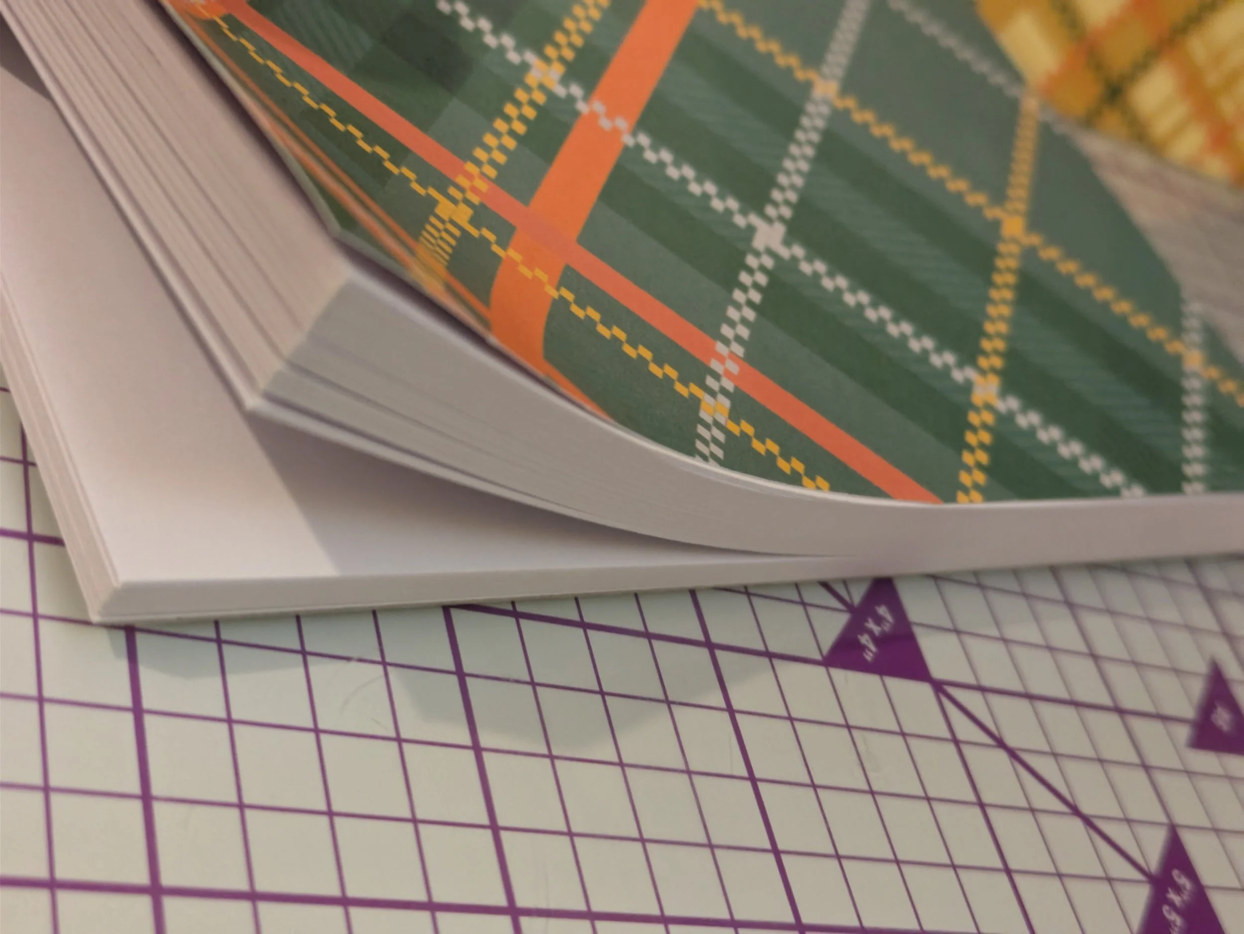Notepad A6 Green plaid pages.jpg