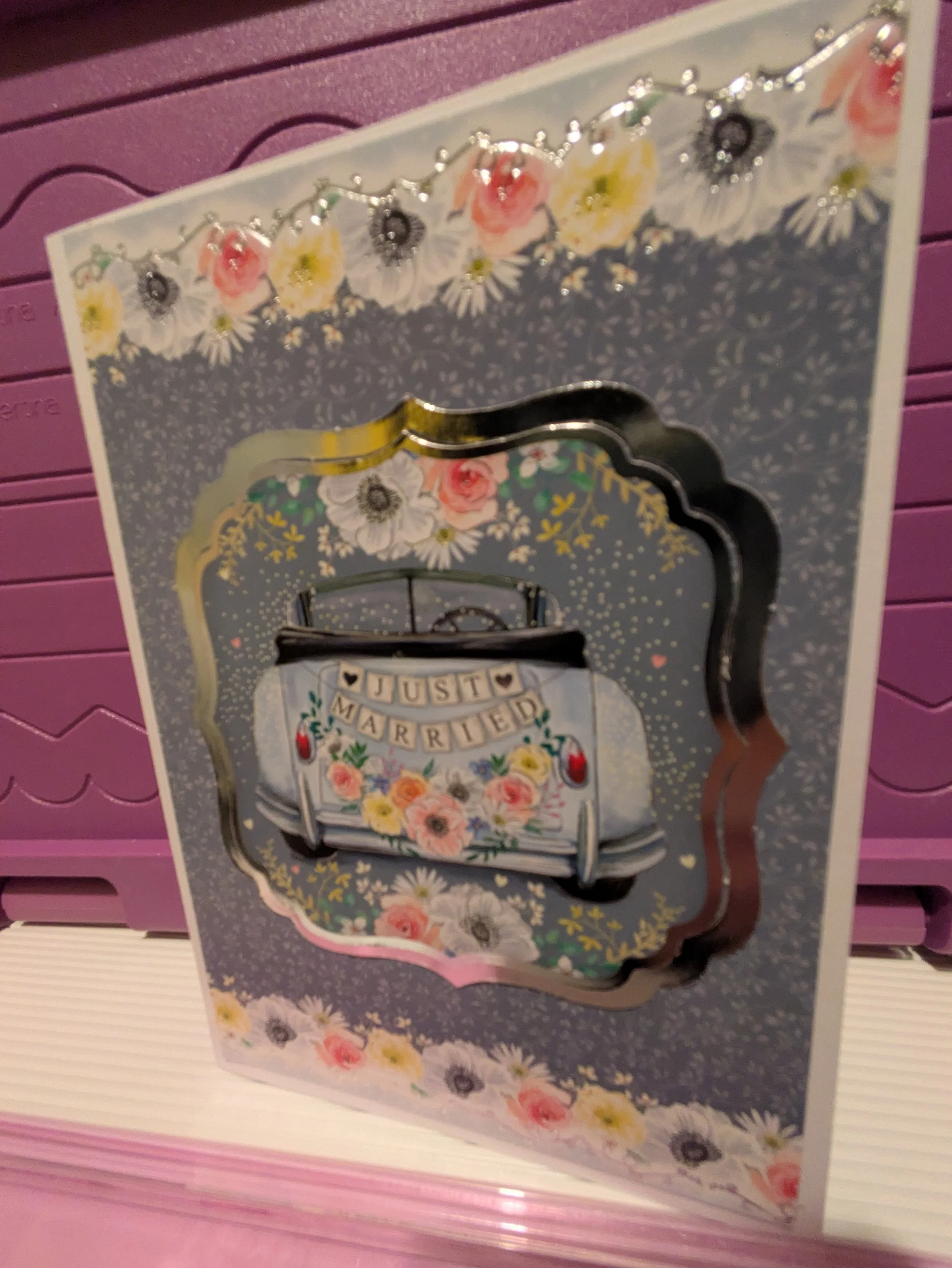 Just married car flowers blue.jpg