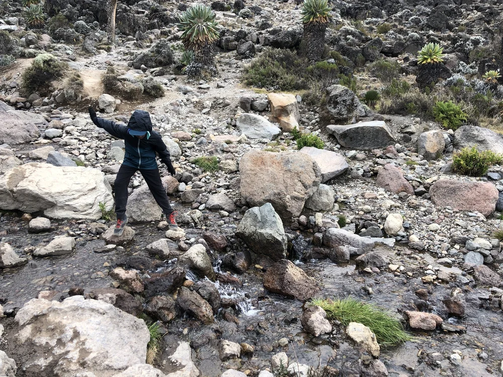 Crossing a stream on the way to Baranco