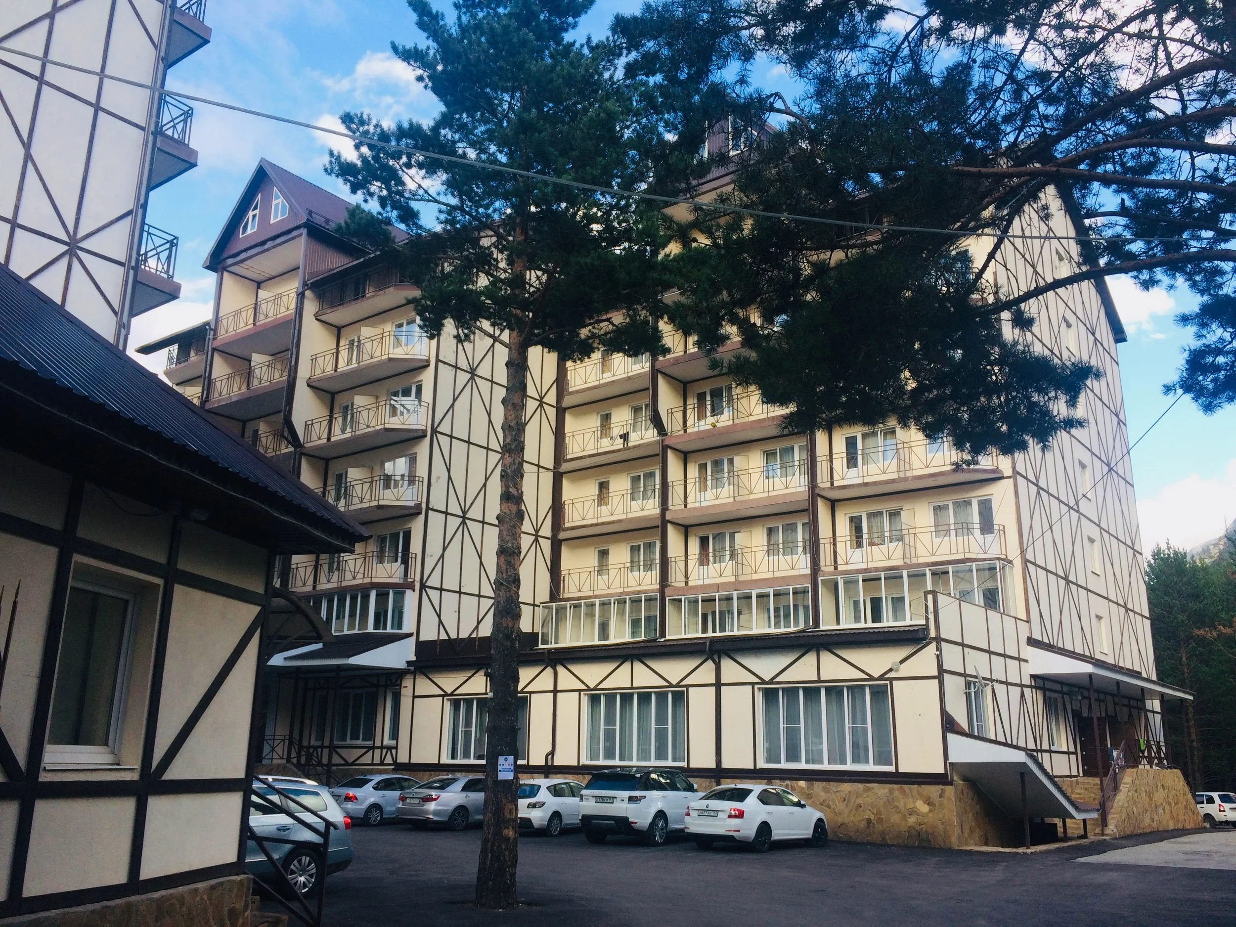 Hotel Snow Leopard (left part of yellow building), Terskol