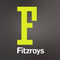Bright yellow letter 'F' with the word 'Fitzroys' below it on a dark background
