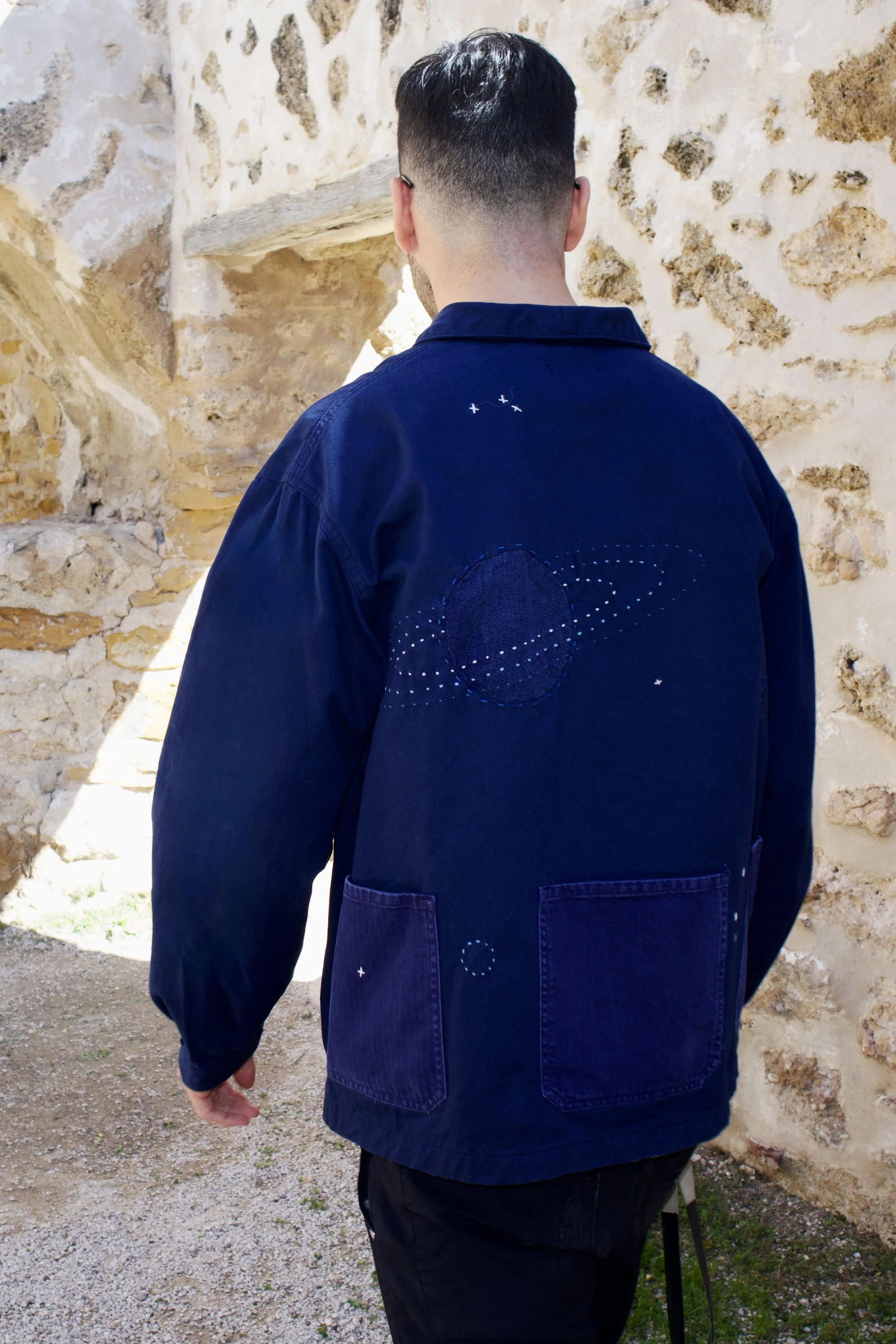 Back of Sack Coat uniform designed by Finery.