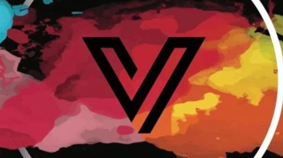 Abstract background with a large black 'V' symbol in the center, colorful watercolor-style splashes in red, pink, yellow, and black.