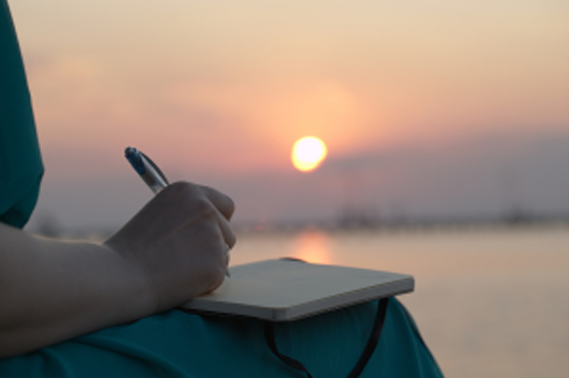 writing at sunset.png