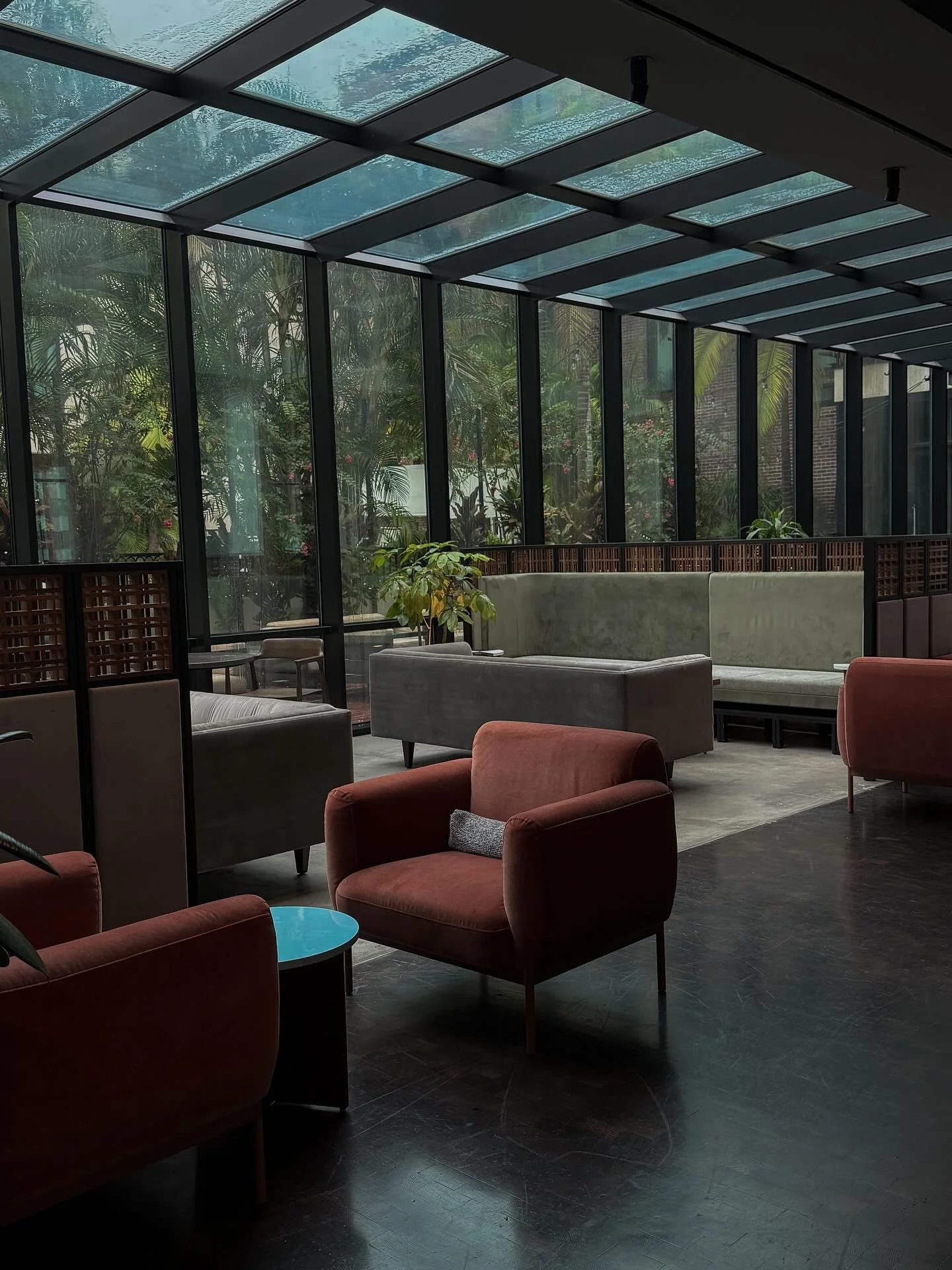 Quiet rainy moments at the Bar + Coffee Shop in the iconic @hotelhaya located in the Historic Ybor District in Tampa,FL. Although a sunny day is always welcomed, something about the down pour complemented the moody interiors. 
#tampaflorida #yborcit