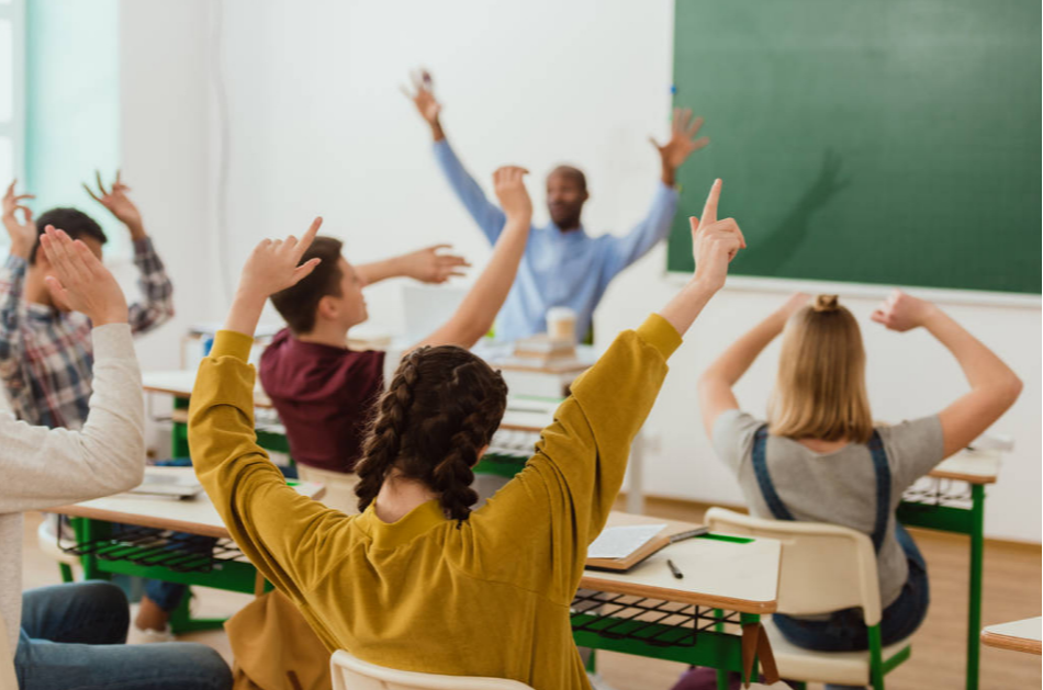 How can schools enhance morale and foster a strong sense of identity among middle school students?