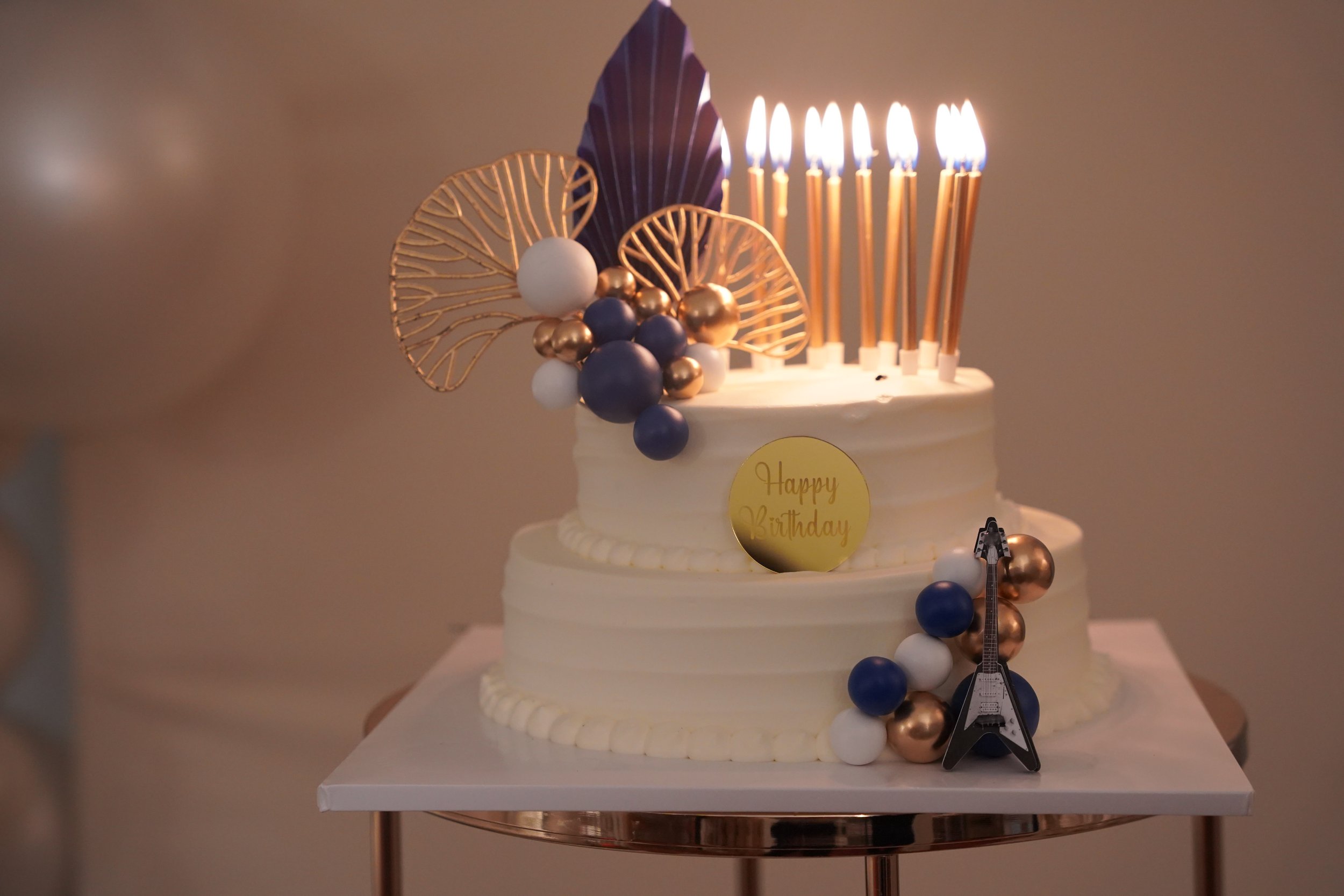 navy blue-gold-birthday theme-backdrop-balloons decoration-guitar-birthday cake-event planner-classic-timeless-birthday-for-men