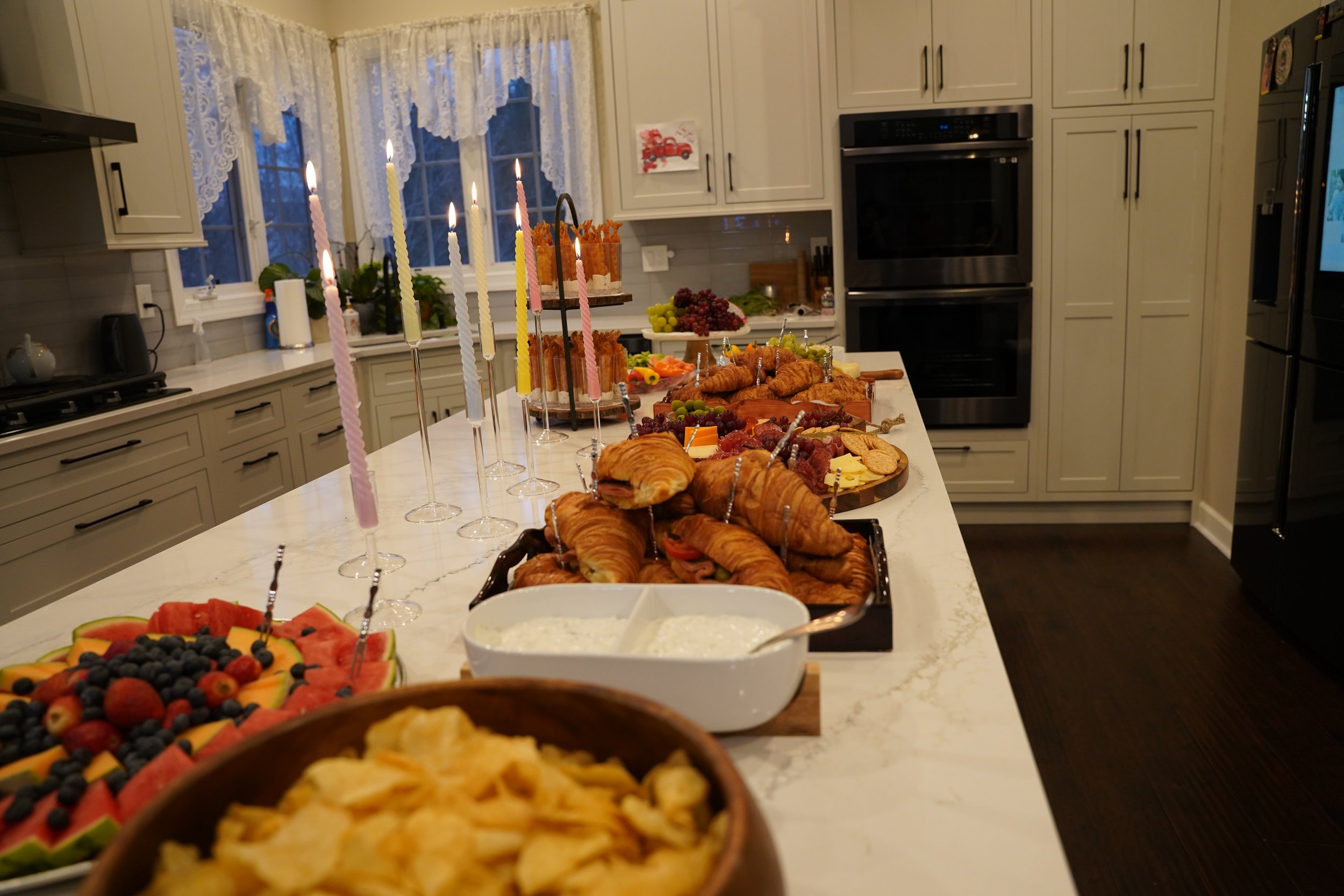 kids-birthday-owl-rainbow-theme-pastel balloons-kids-activity-personalized celebrations-design-rainbow -theme-appetizer table design-rainbow -theme-cheeseboard-shrimp tower-fruit palter 